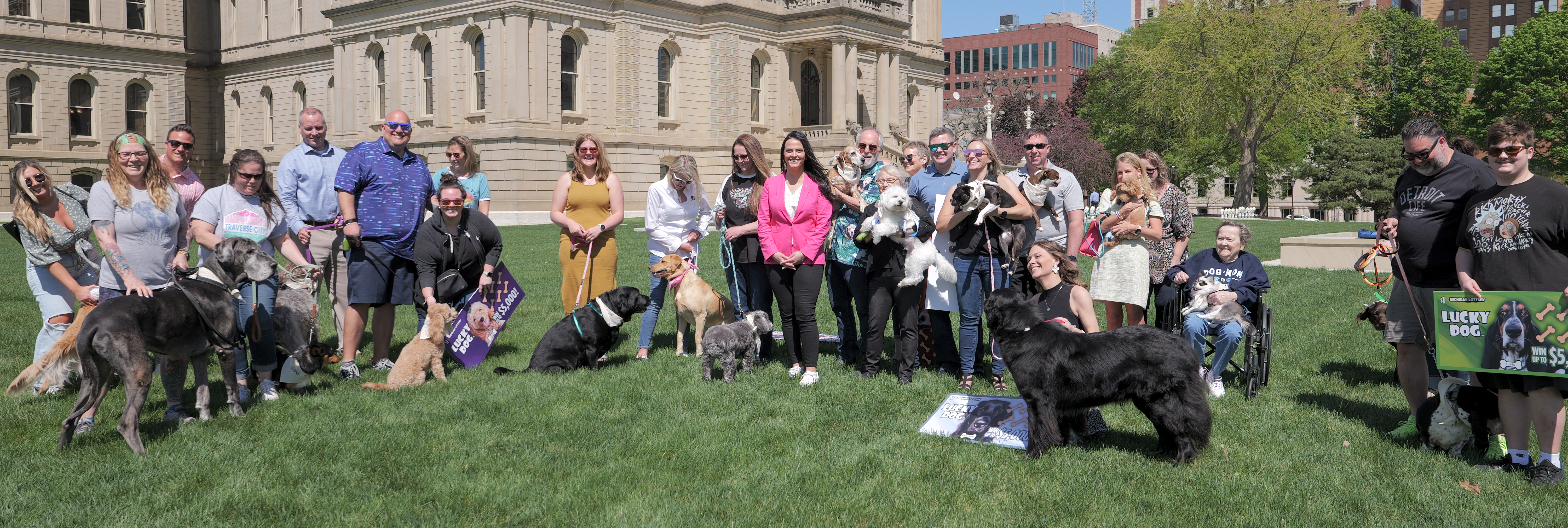 Dogs, and their owners, selected to appear in the Michigan Lottery’s upcoming Lucky Dog game.