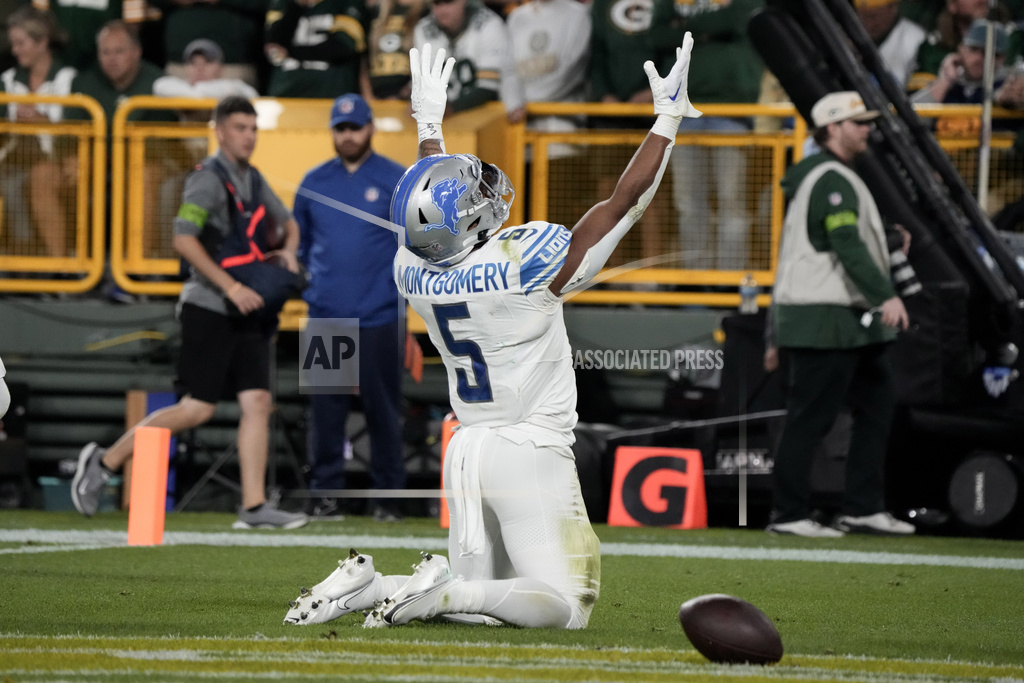 David Montgomery runs wild as Lions beat Packers 34-20 to take early command of NFC North