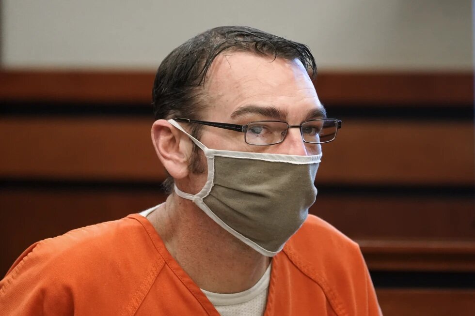 James Crumbley, father of Ethan Crumbley, a teenager accused of killing four students in a shooting at Oxford High School, appears in court for a preliminary examination on involuntary manslaughter charges in Rochester Hills, Mich., Tuesday, Feb. 8, 2022.