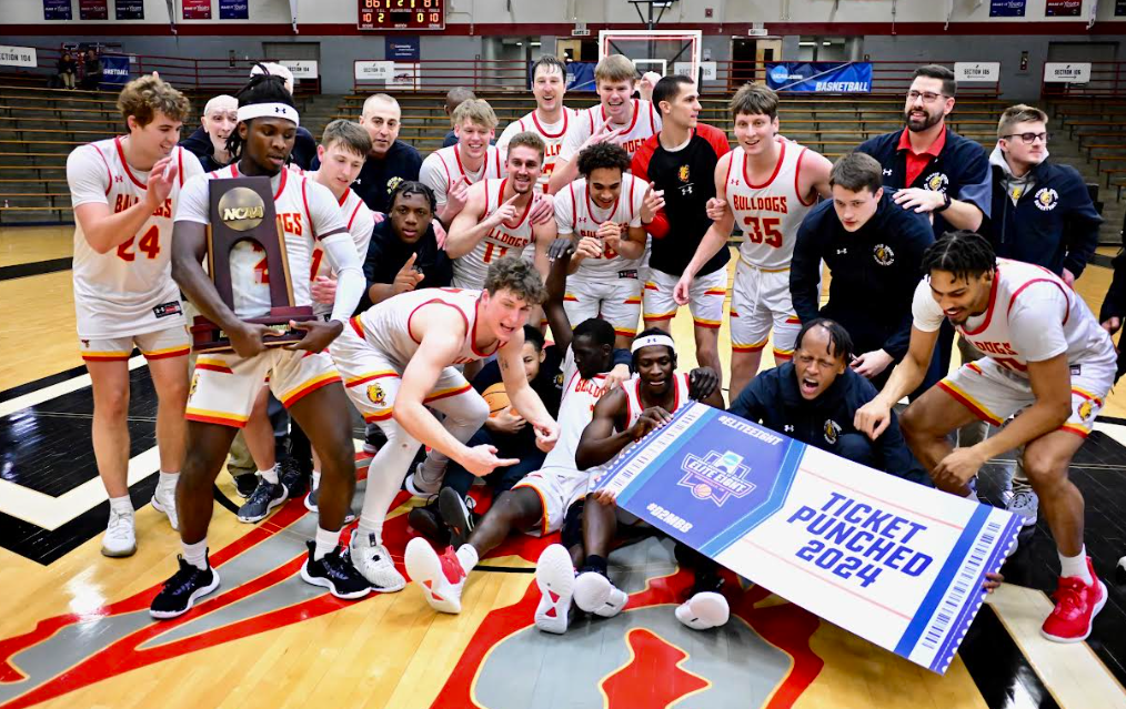 (Ferris State Athletics) The Ferris State men's basketball team celebrates their Midwest Regional Championship victory over Lake Superior State on Tuesday.