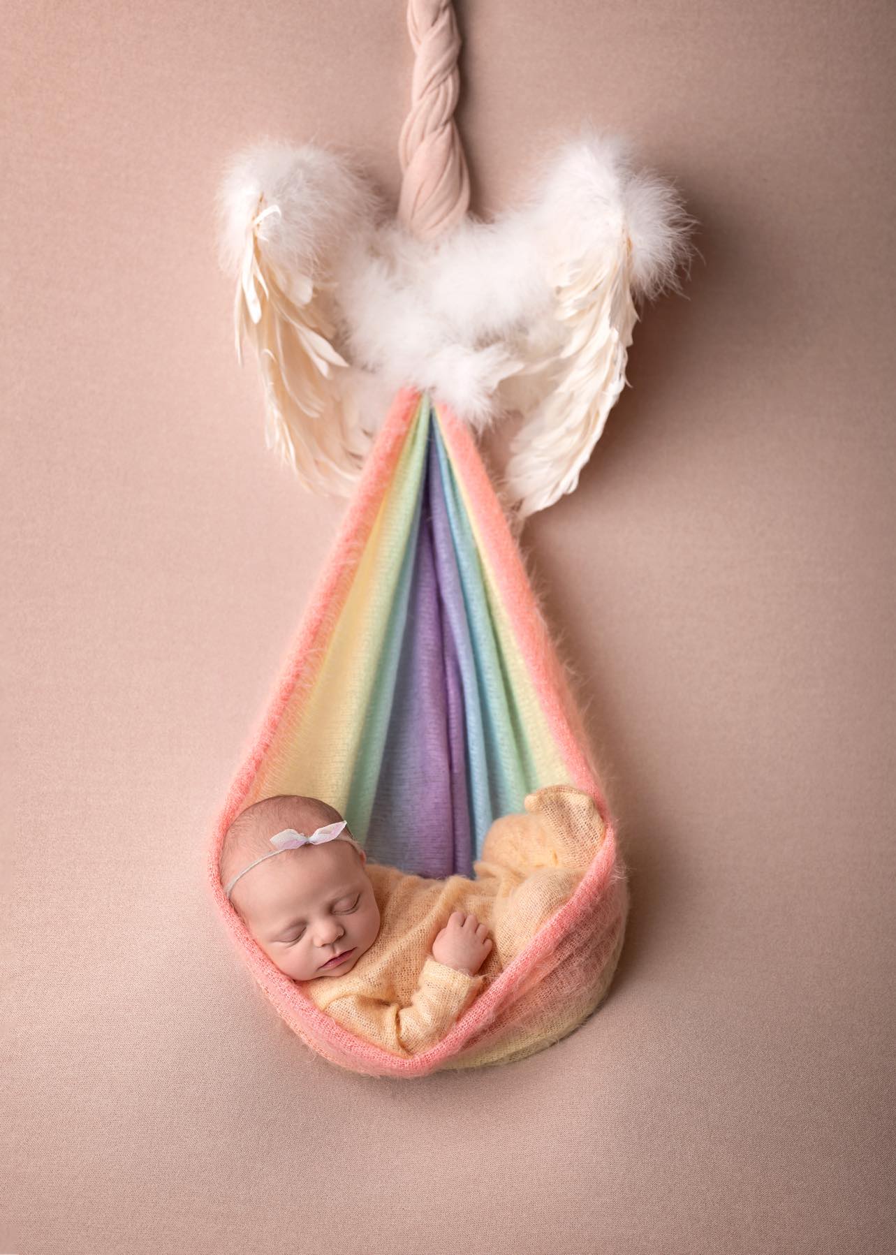 Ben and Katie Brooks' daughter Ava is pictured as a newborn in a birth announcement photo which includes an angel above her honoring her late twin brother, Linkin.