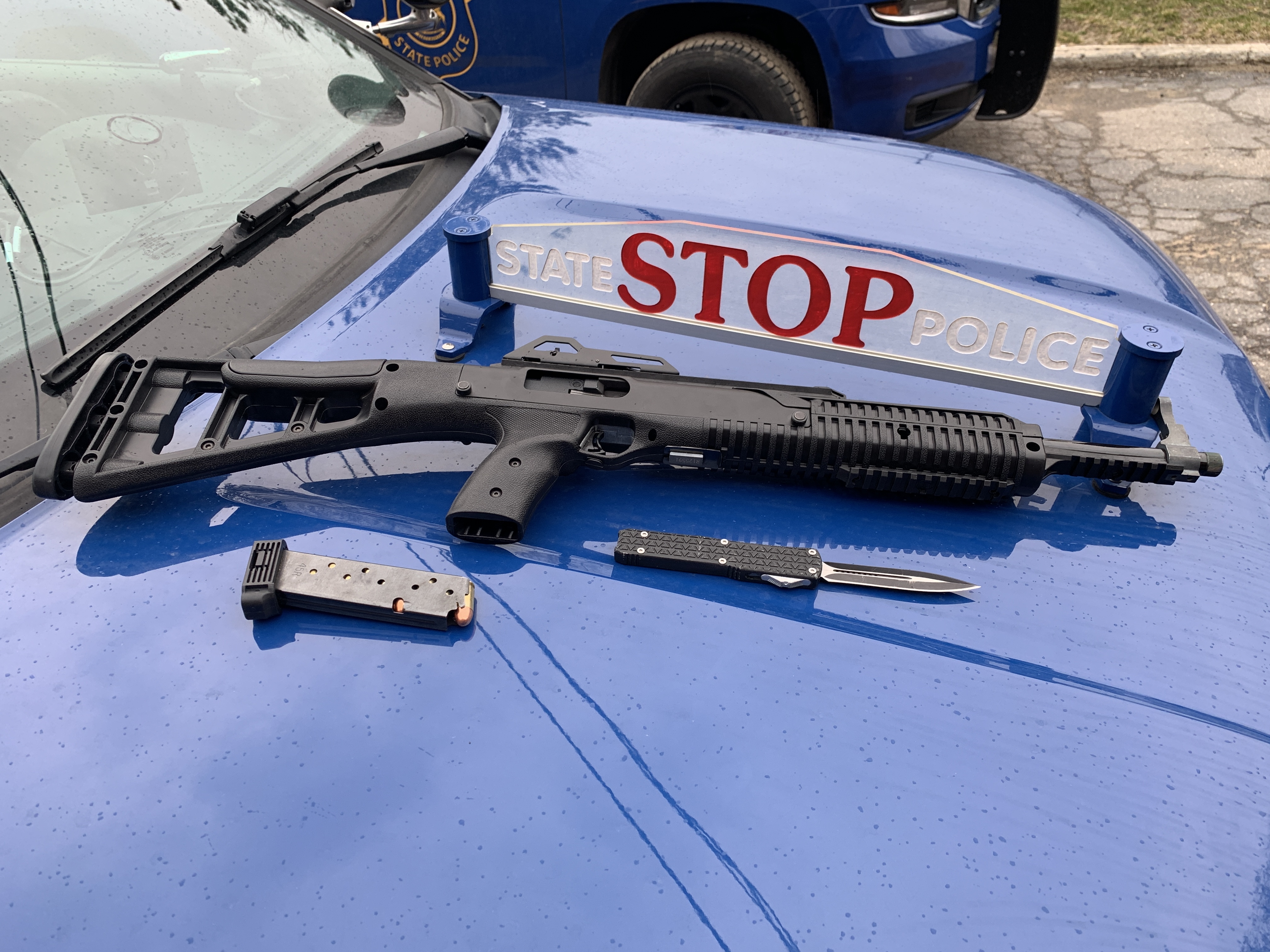 Troopers nab driver they say repeatedly blew through stop signs in Grand Traverse; also find weapons in the vehicle