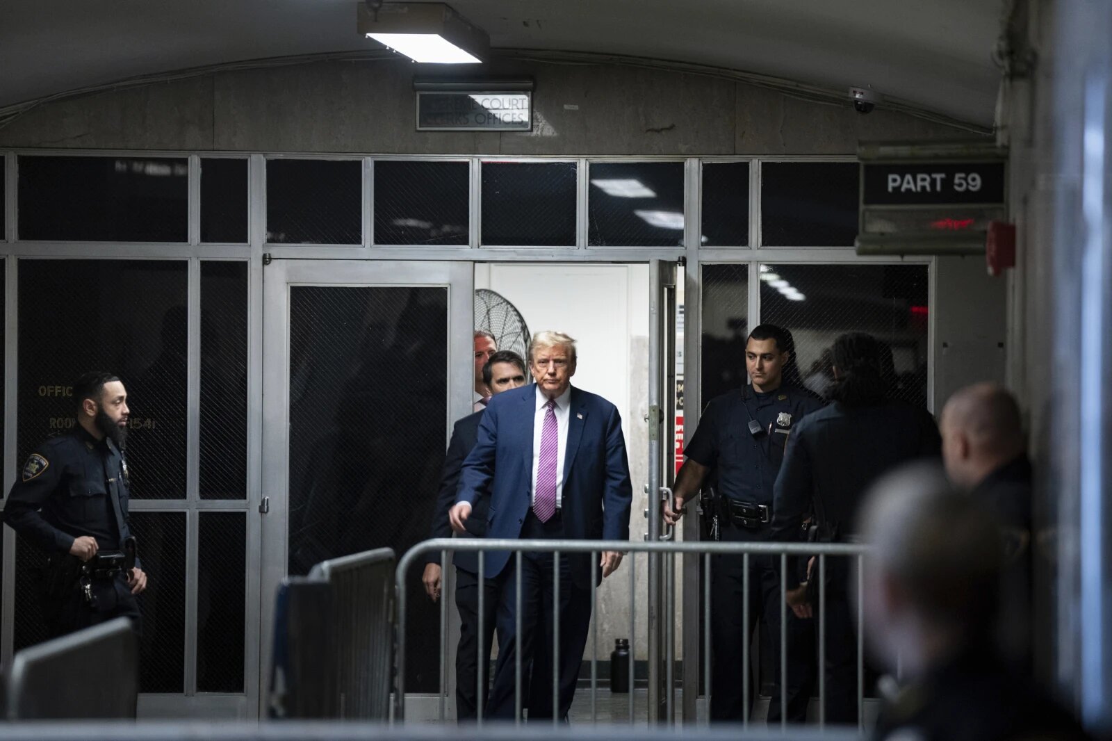 Former President Donald Trump steps outside the courtroom during a break at Manhattan criminal in New York, Friday, April 19, 2024.