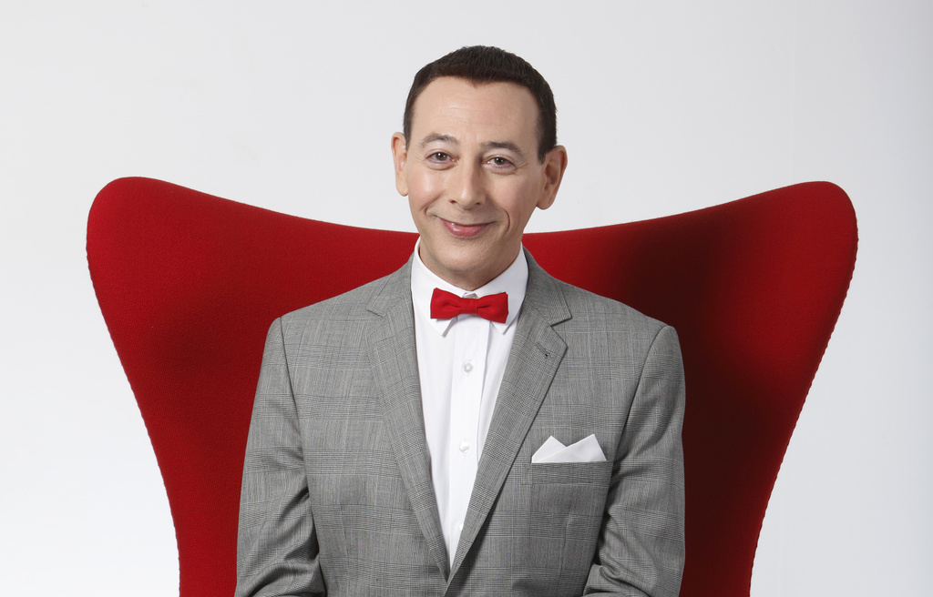 FILE - Actor Paul Reubens portraying Pee-wee Herman poses for a portrait while promoting "The Pee-wee Herman Show" live stage play, Monday, Dec. 7, 2009, in Los Angeles. Reubens died Sunday night after a six-year struggle with cancer that he did not make public, his publicist said in a statement. (AP Photo/Danny Moloshok, File)
