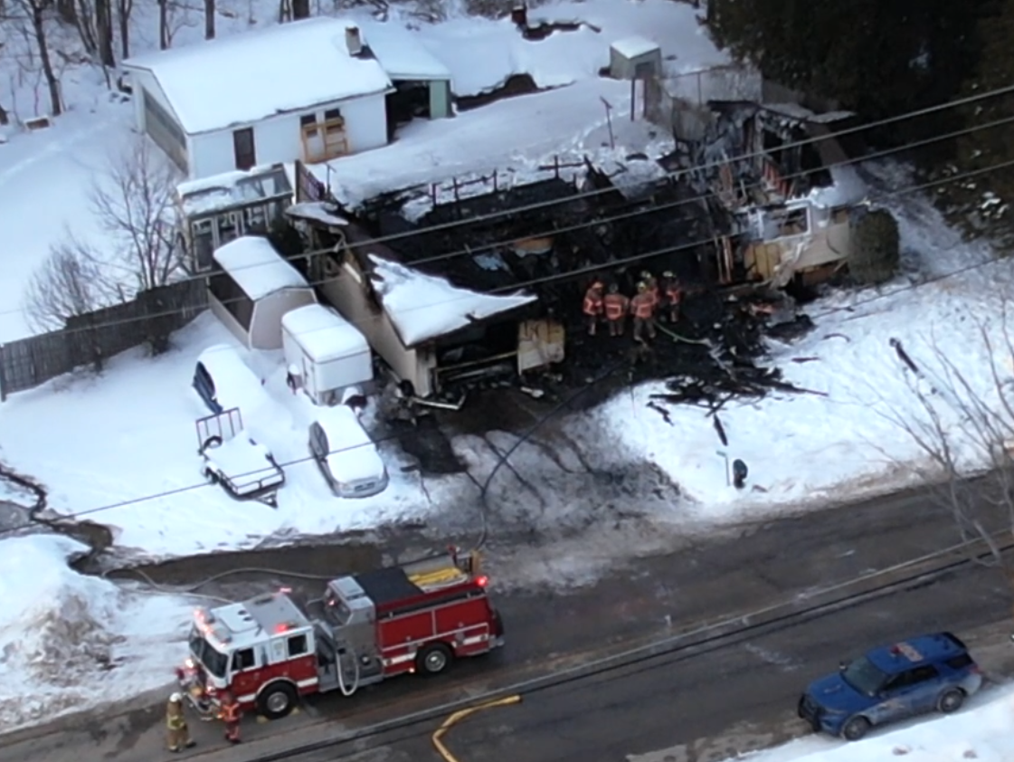 St. Ignace schools put on lockdown as firefighters battle house fire.