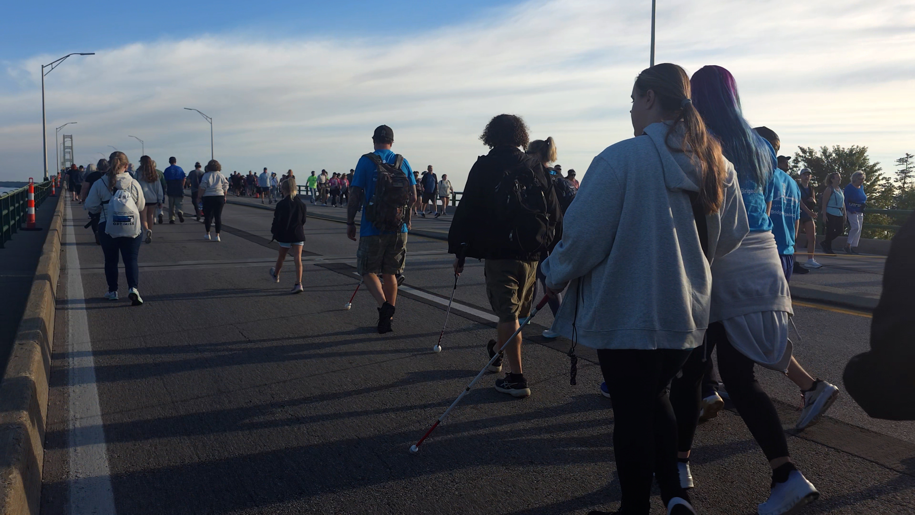 Bridge Brigade walks the Mackinac Bridge for the first time, highlighting work done by blind and low-vision students