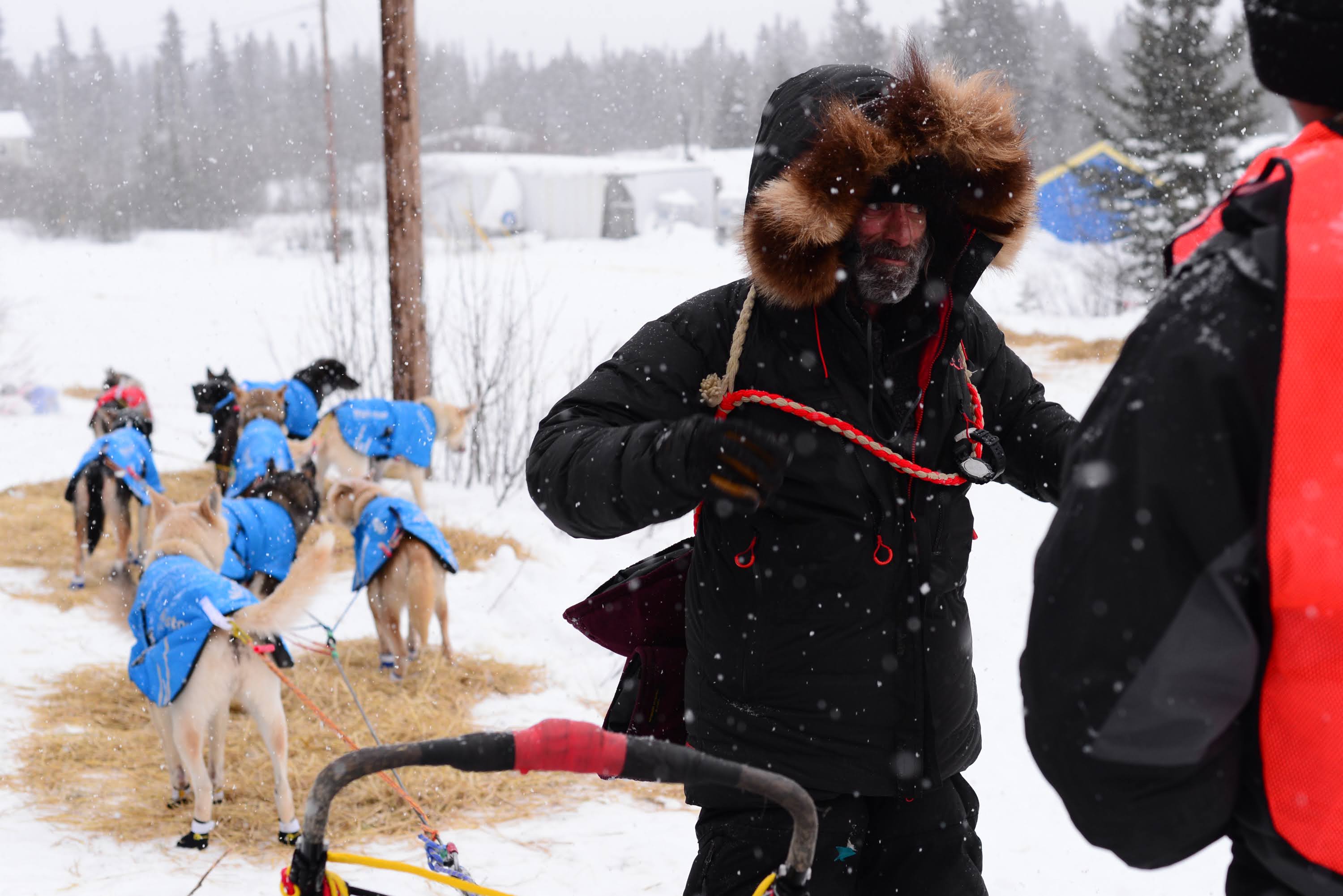 A dozen mushers brave wind, snow and whiteout conditions as the Kobuk 440  kicks off