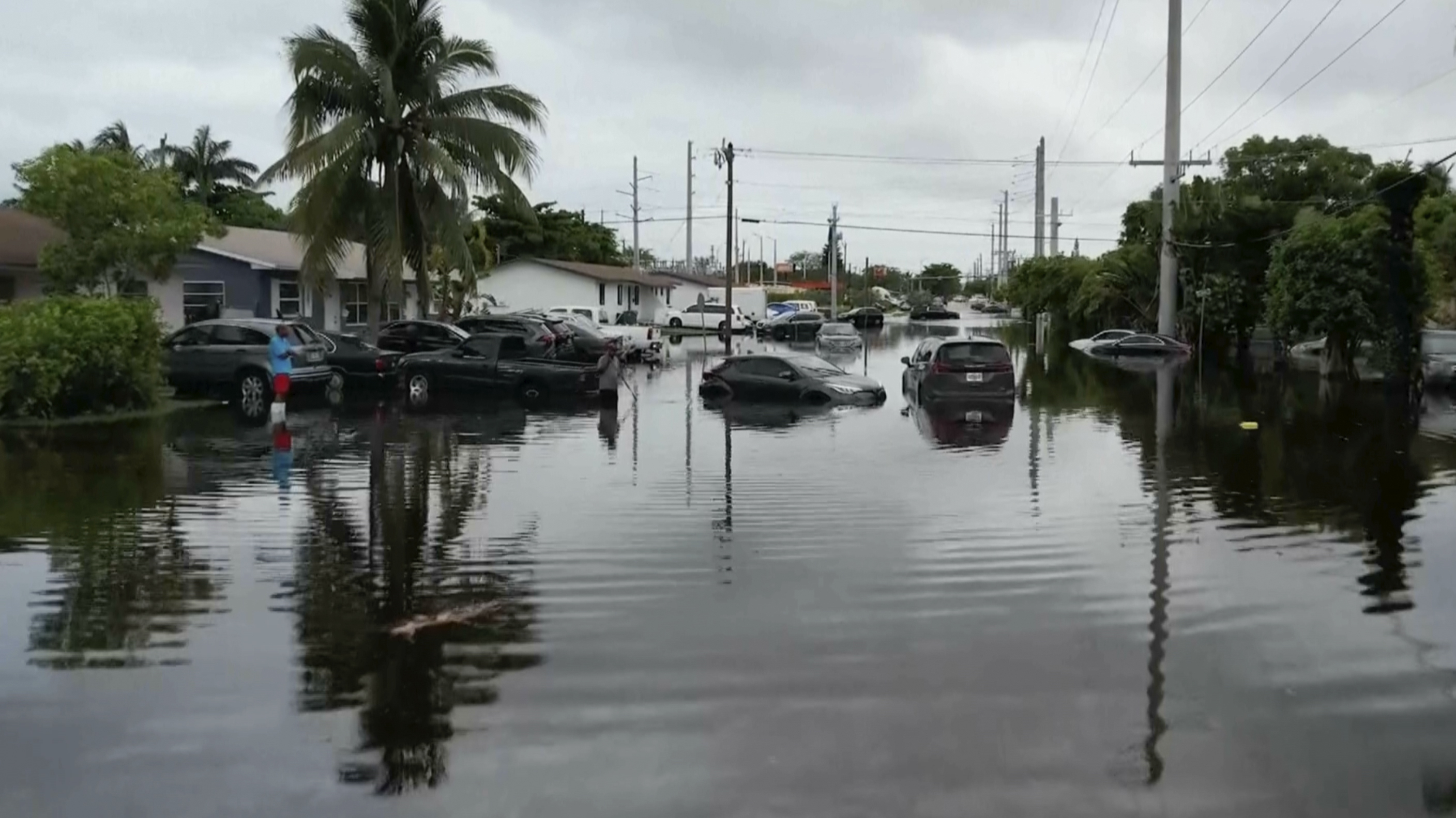 Tropical rainstorms in South Florida lead to flight delays and streets ...