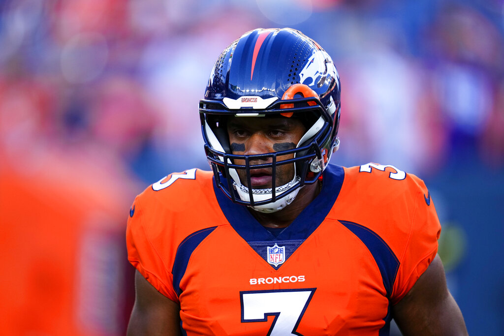 Broncos quarterback Russell Wilson greeted with boos in return to