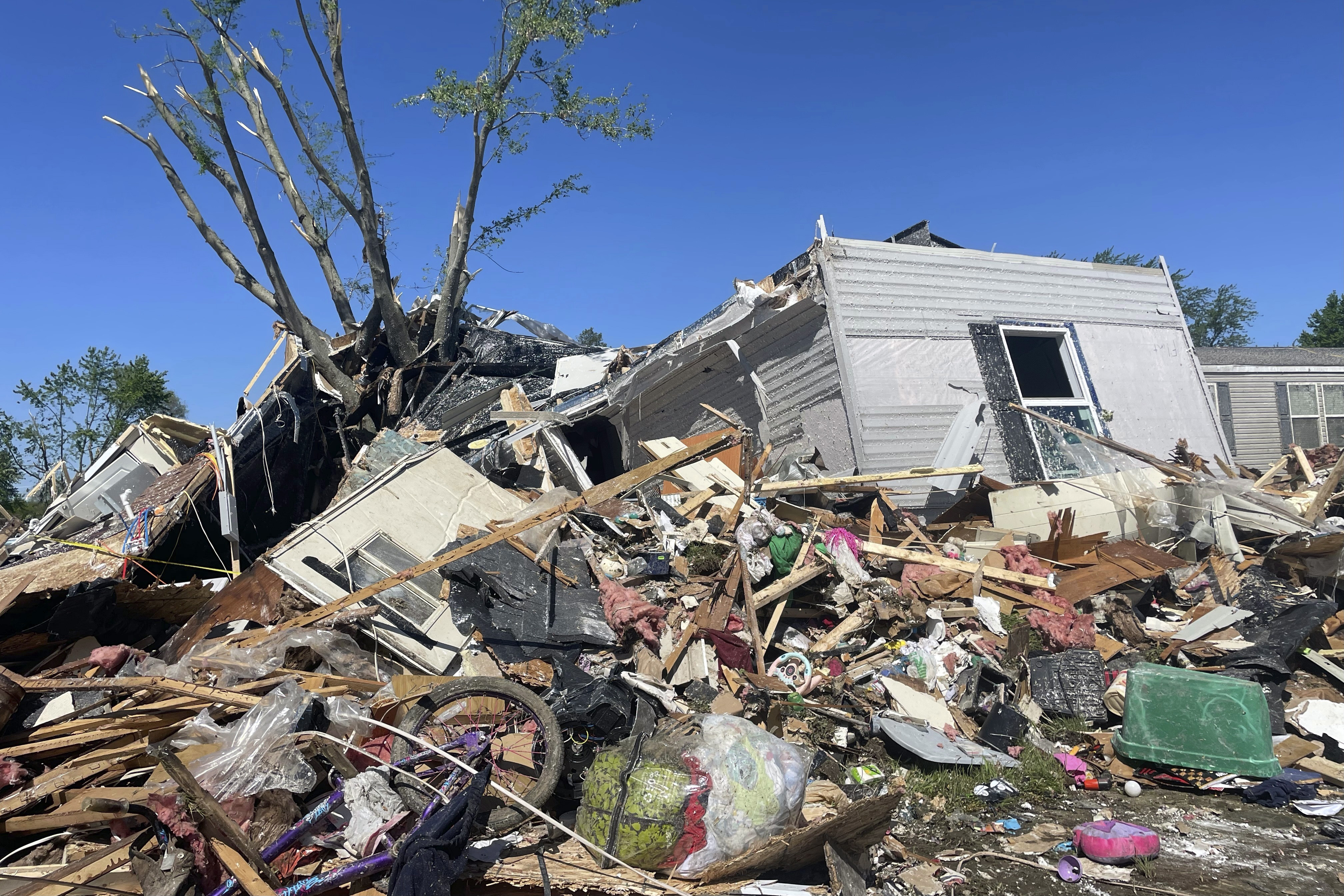 Tornados shred FedEx facility in Michigan, leave man dead in