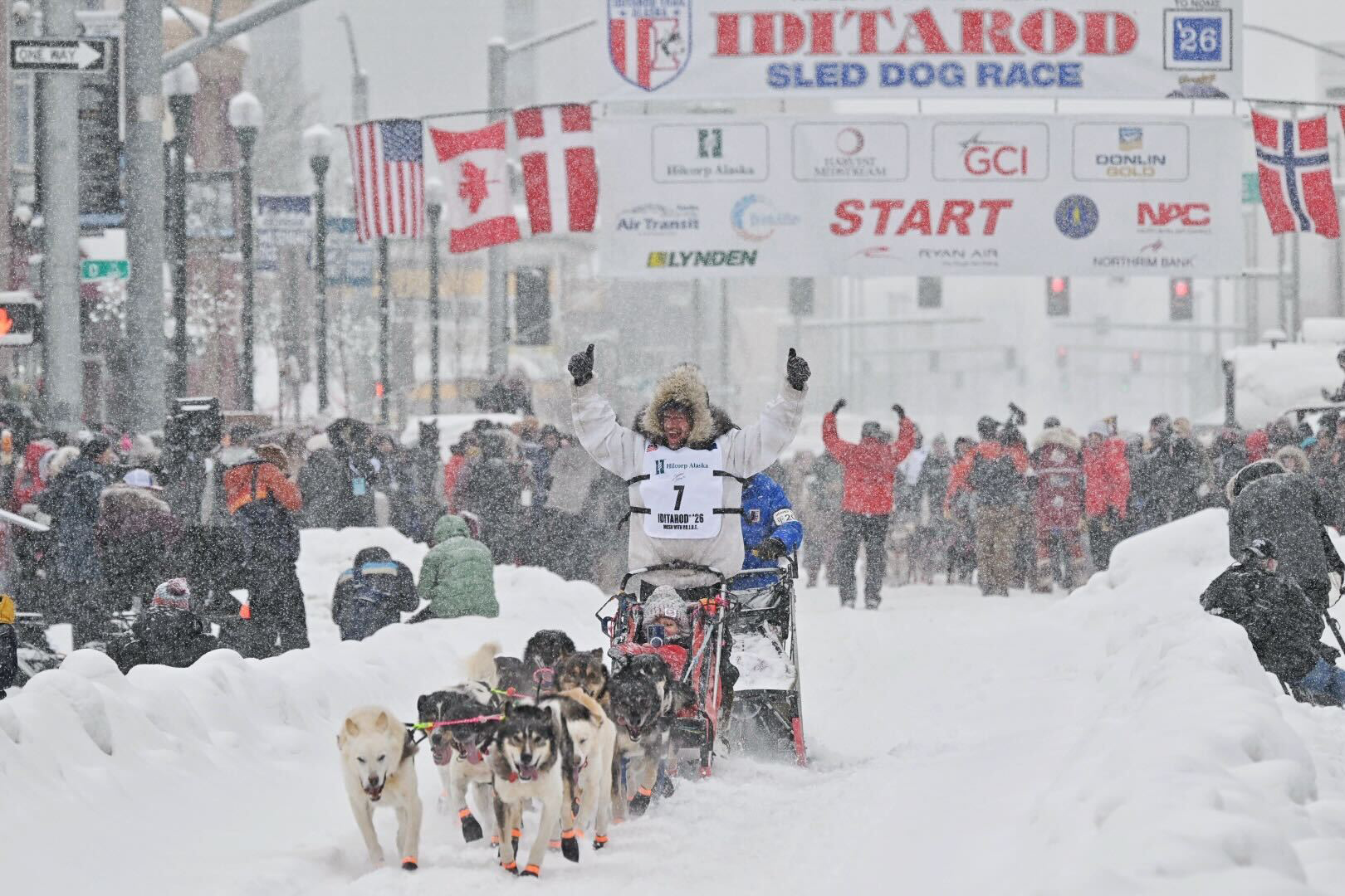 In Iditarod ceremonial start, mushers receive warm welcome on a