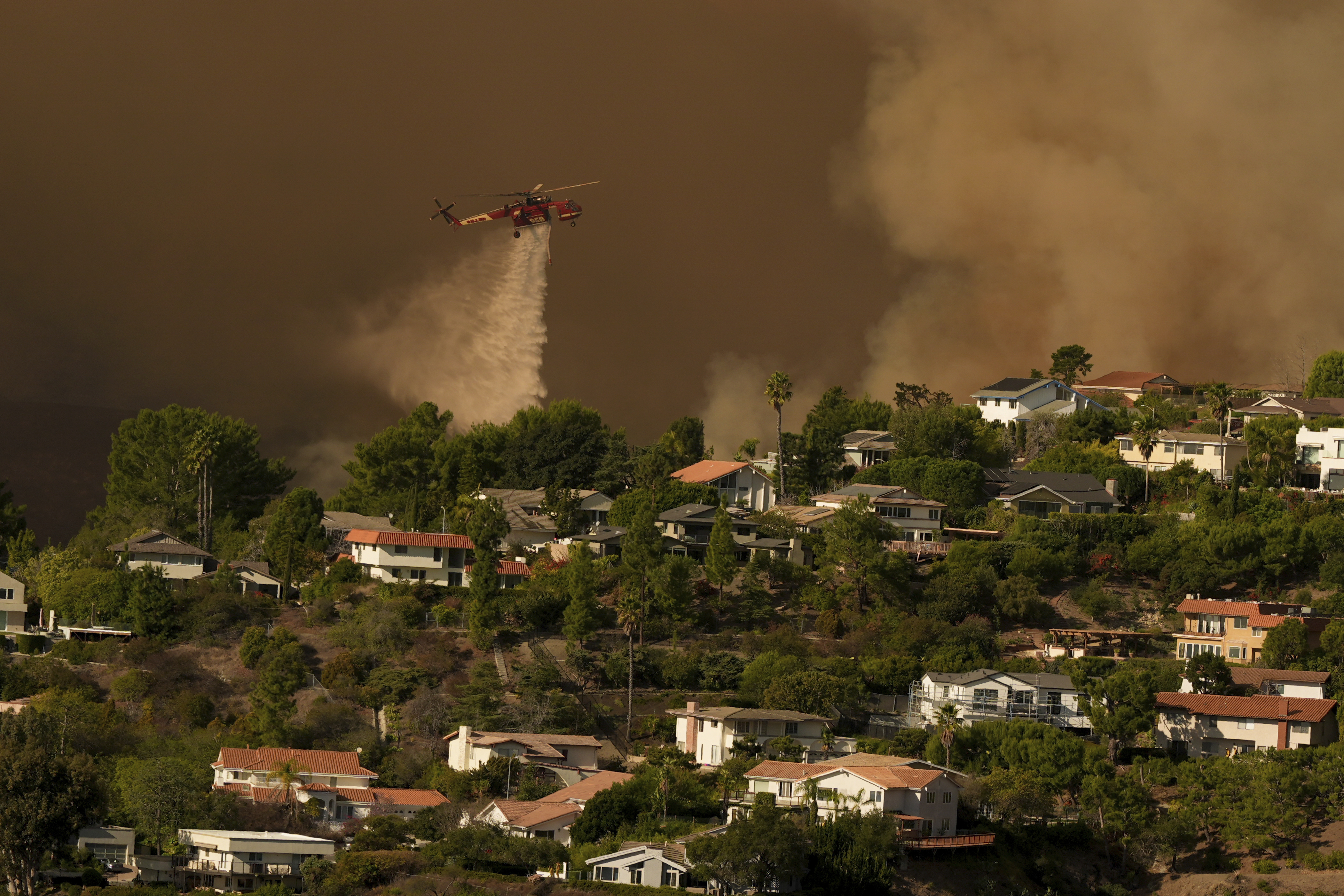 Los Angeles wildfires death toll rises as crews fight heavy winds to save  homes and landmarks - Anchorage Daily News