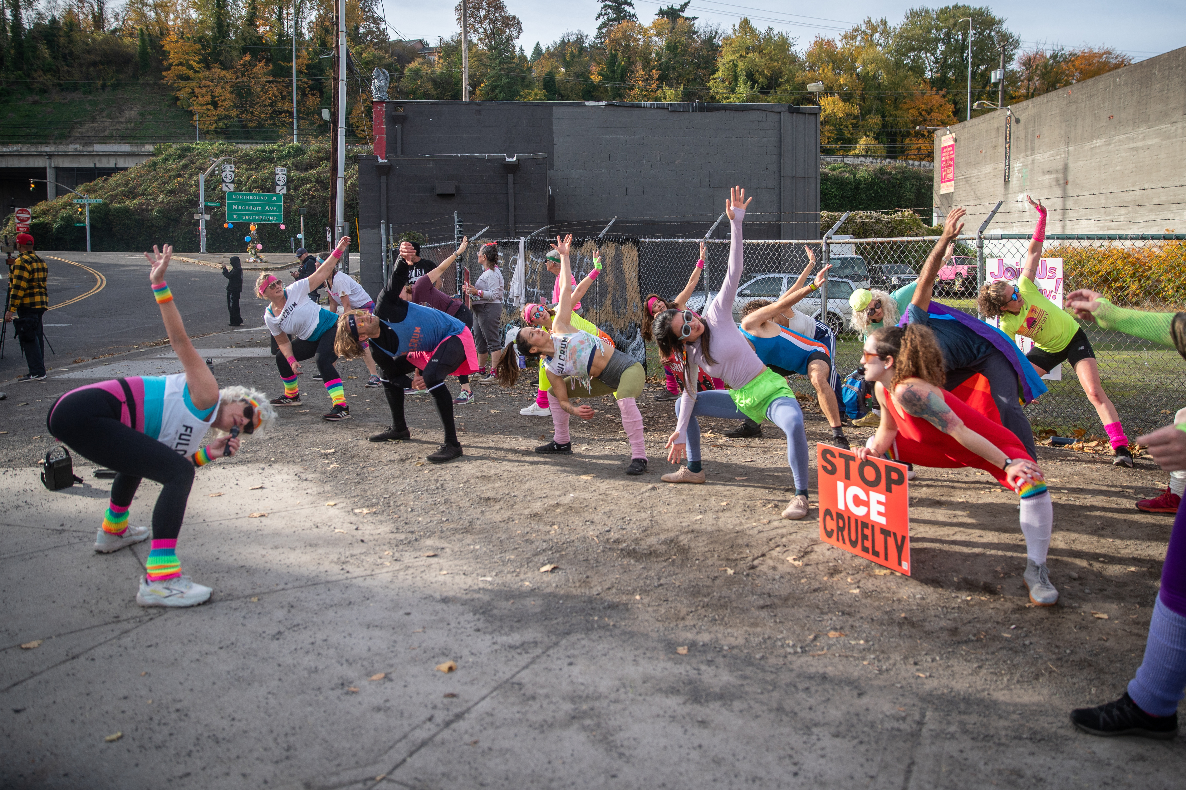 Participants in Fulcrum Fitness’s “Sweatin’ Out the Fascists” held an ’80s-aerobics peaceful protest outside the U.S. Immigration and Customs Enforcement (ICE) facility in South Portland on Sunday, Nov. 9, 2025, collecting donations for the Oregon Food Bank.
