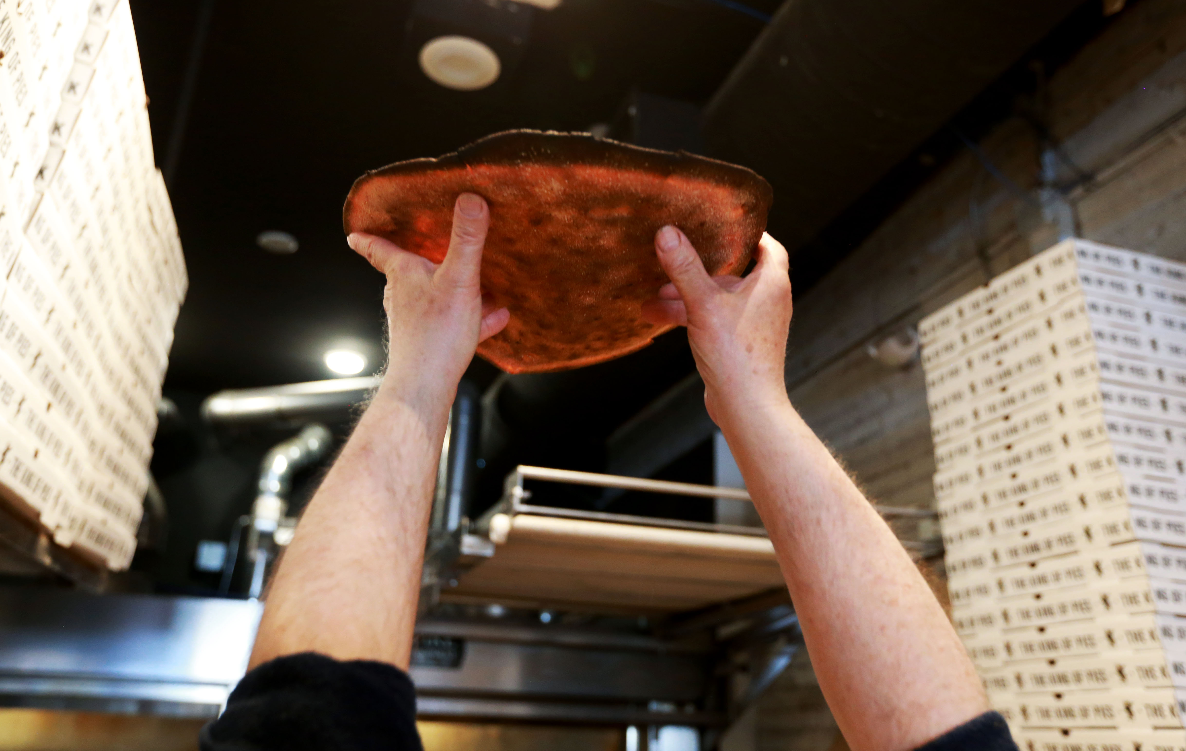 Pizza maker Al Santillo is making pizza at Coniglio’s as his place is ...