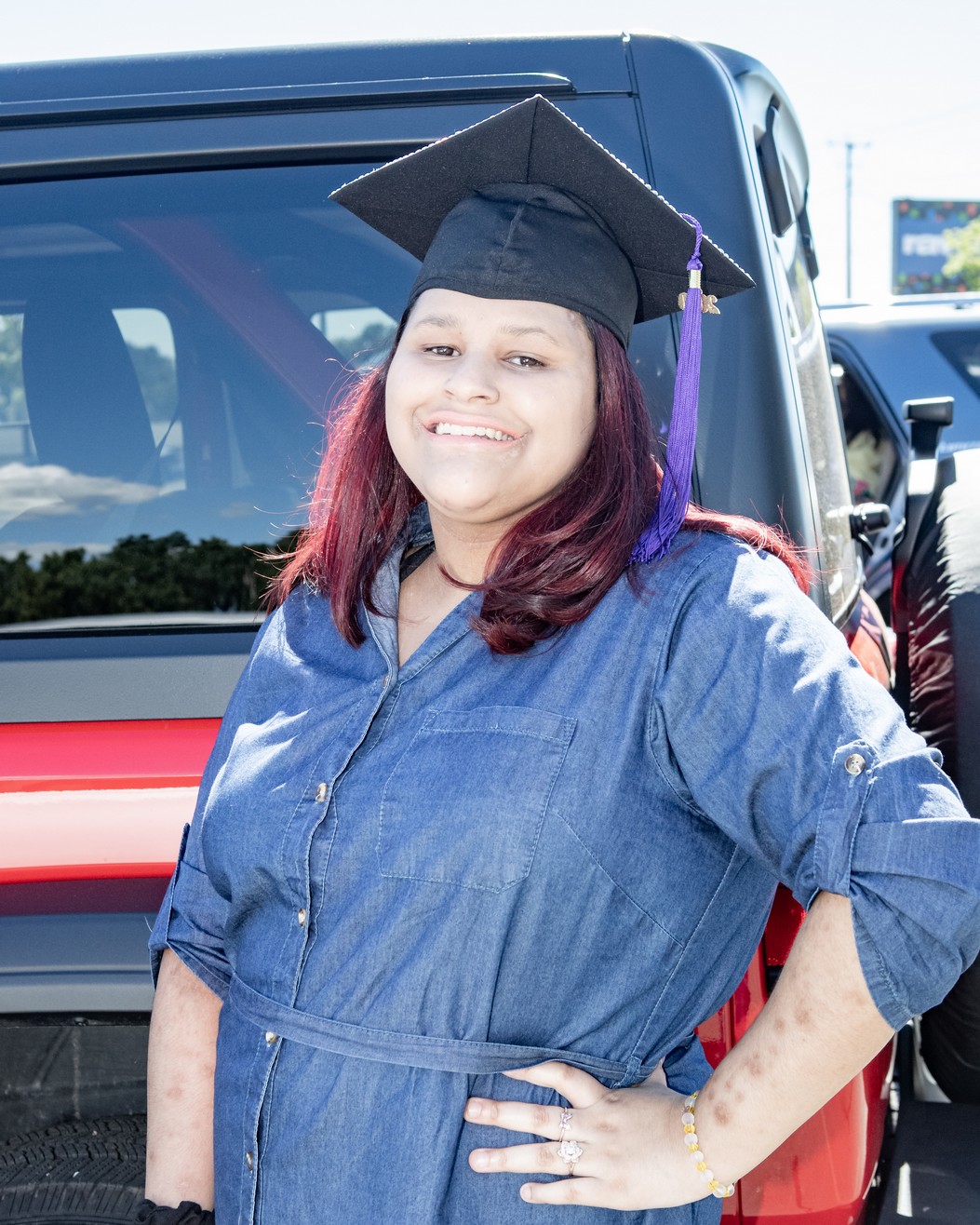 Shantell Delgado poses for a photo at the Veritas Prep Charter School 8th grade 2020 DRIVE-In Graduation held in the parking lot of the Eastfield Mall. (Danny Nason Photo)