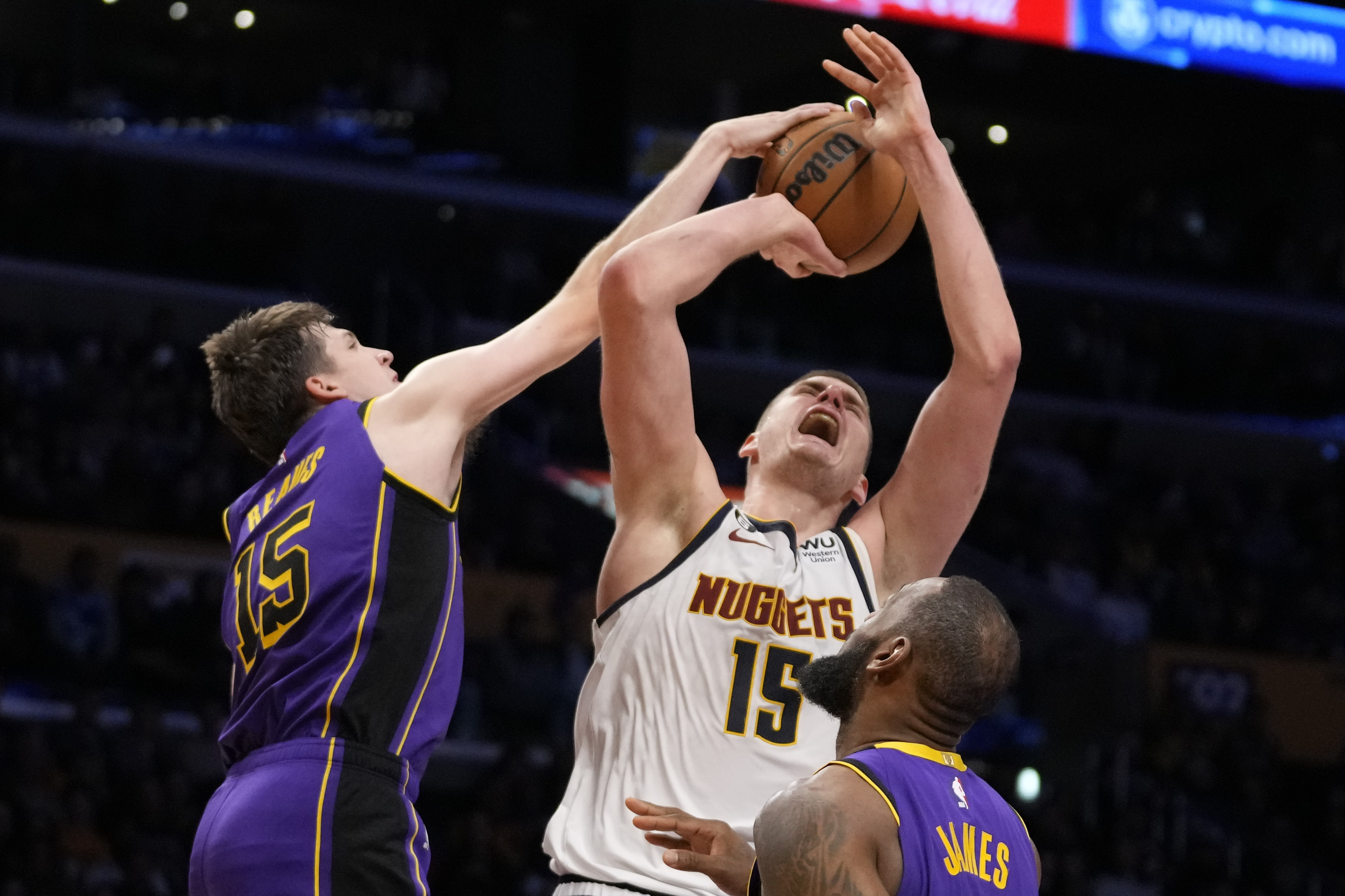 Lakers charge back but Nuggets hold on to take Game 1