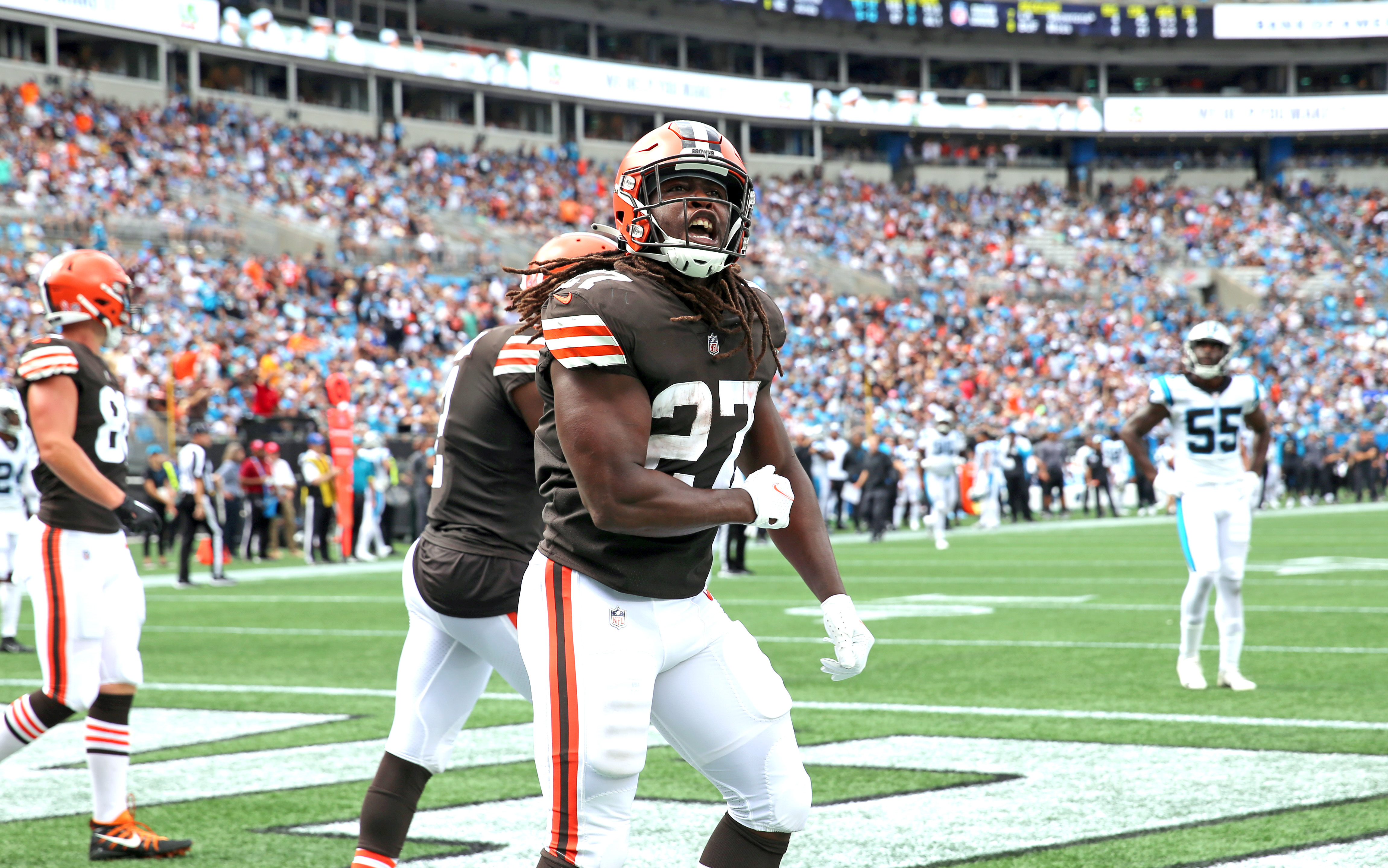 Cleveland Browns running back Kareem Hunt scores past Carolina Panthers  safety Xavier Woods during the first half of an NFL football game on  Sunday, Sept. 11, 2022, in Charlotte, N.C. (AP Photo/Rusty