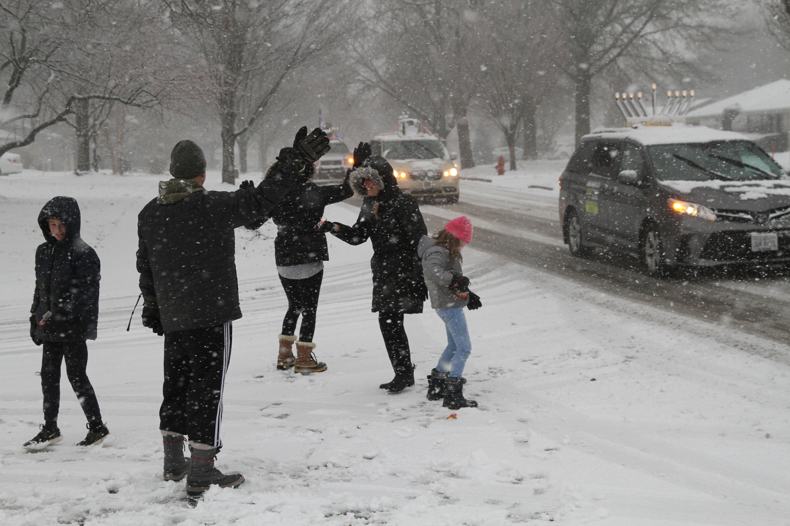 Menorah-topped cars parade through Cleveland eastern suburbs