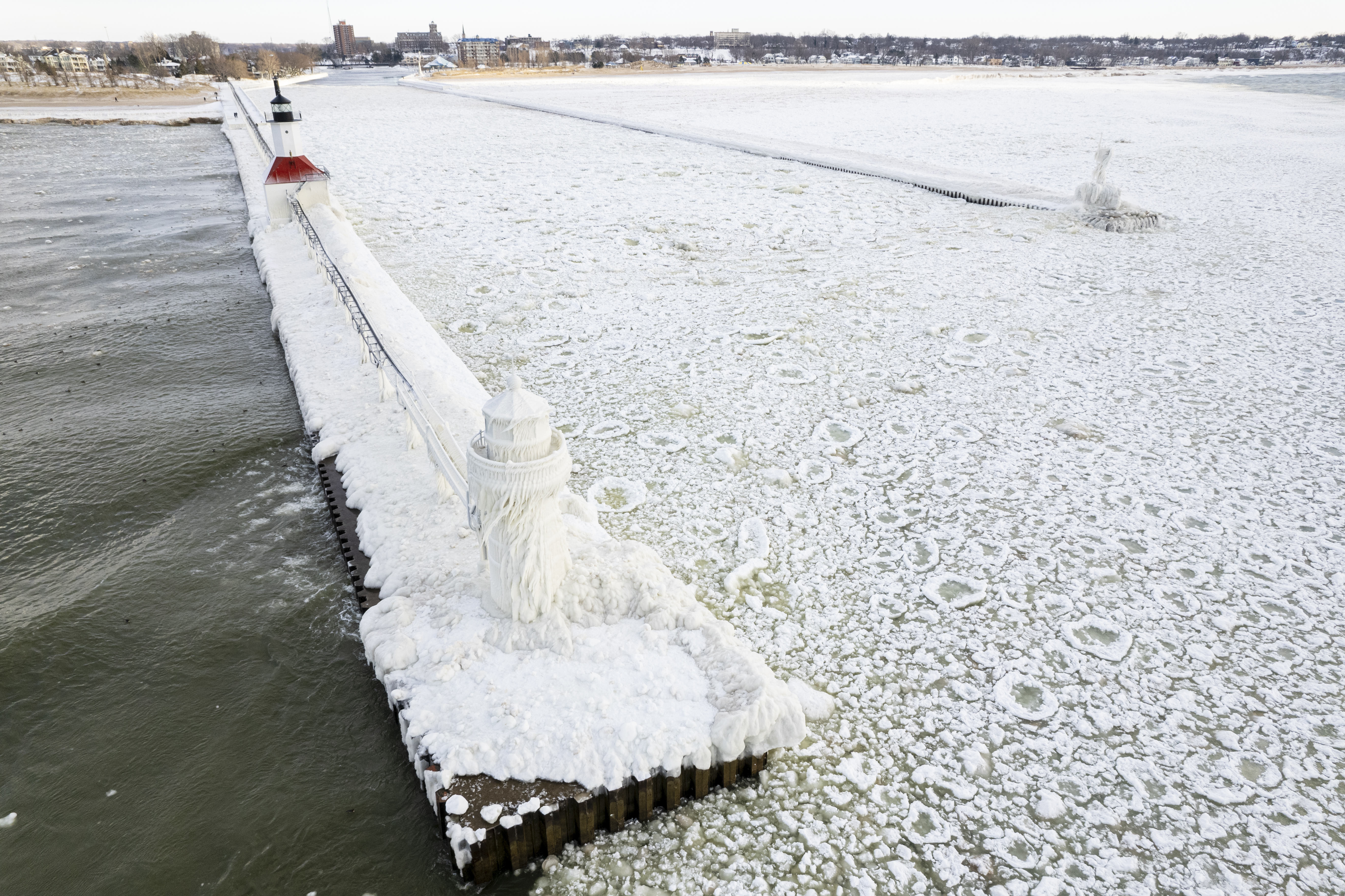 St. Joseph transforms into a whimsical shoreline of ice after winter storm  - mlive.com