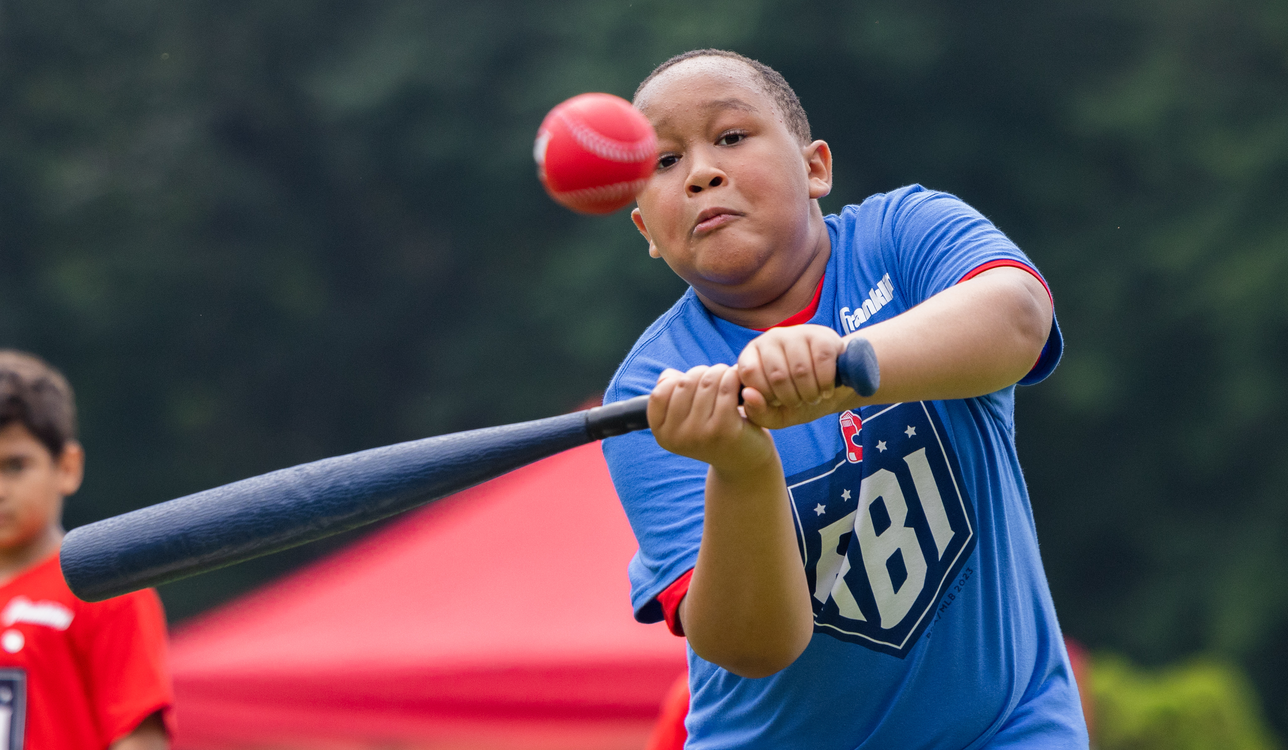 Square One children participate in a baseball & softball clinic