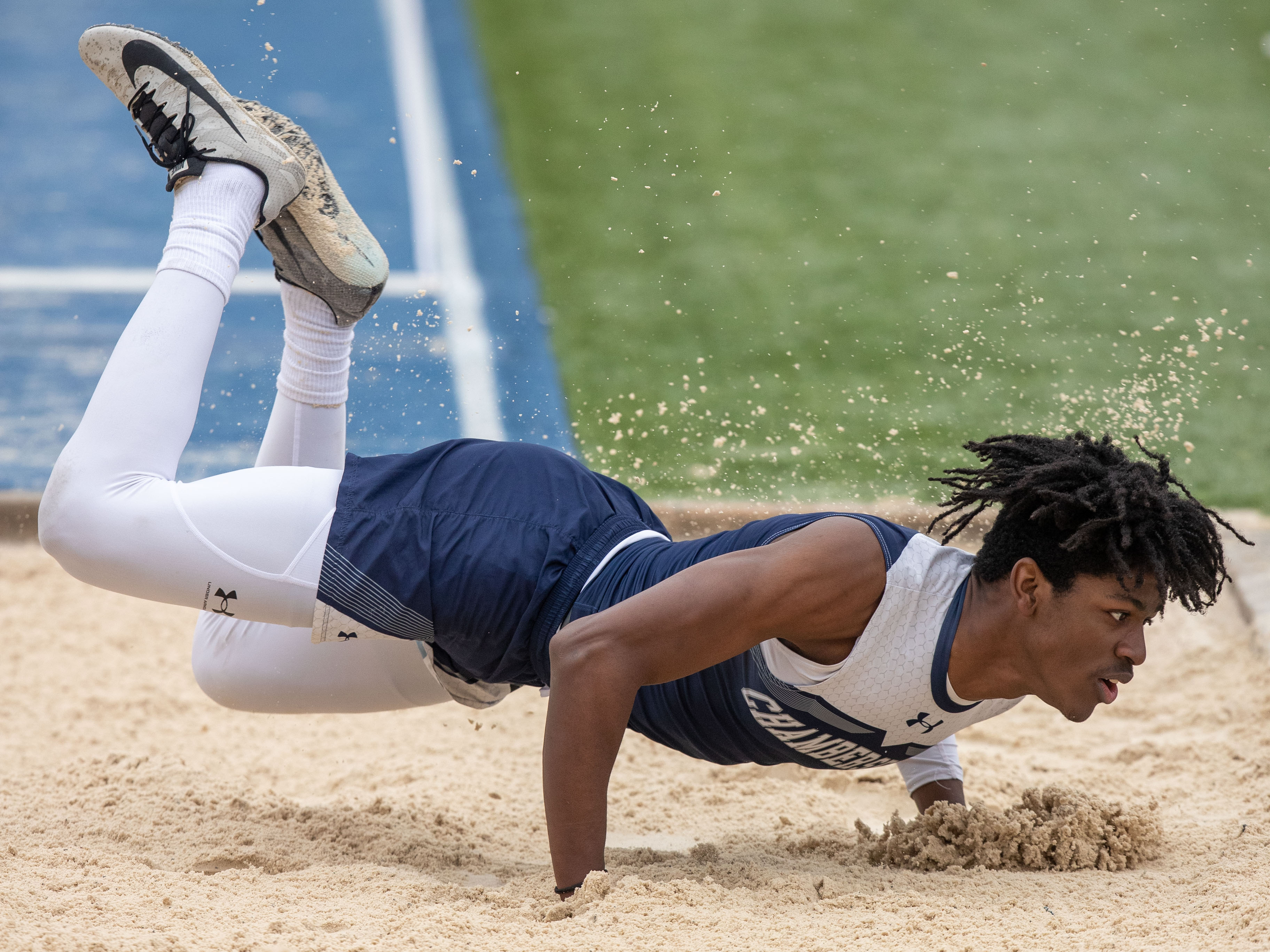 Jermere Jones, flips forward with triple jumping at the 2023 Tim Cook Memorial Invitational track & field meet at Chambersburg, Pa., Mar. 25, 2023.Mark Pynes | pennlive.com