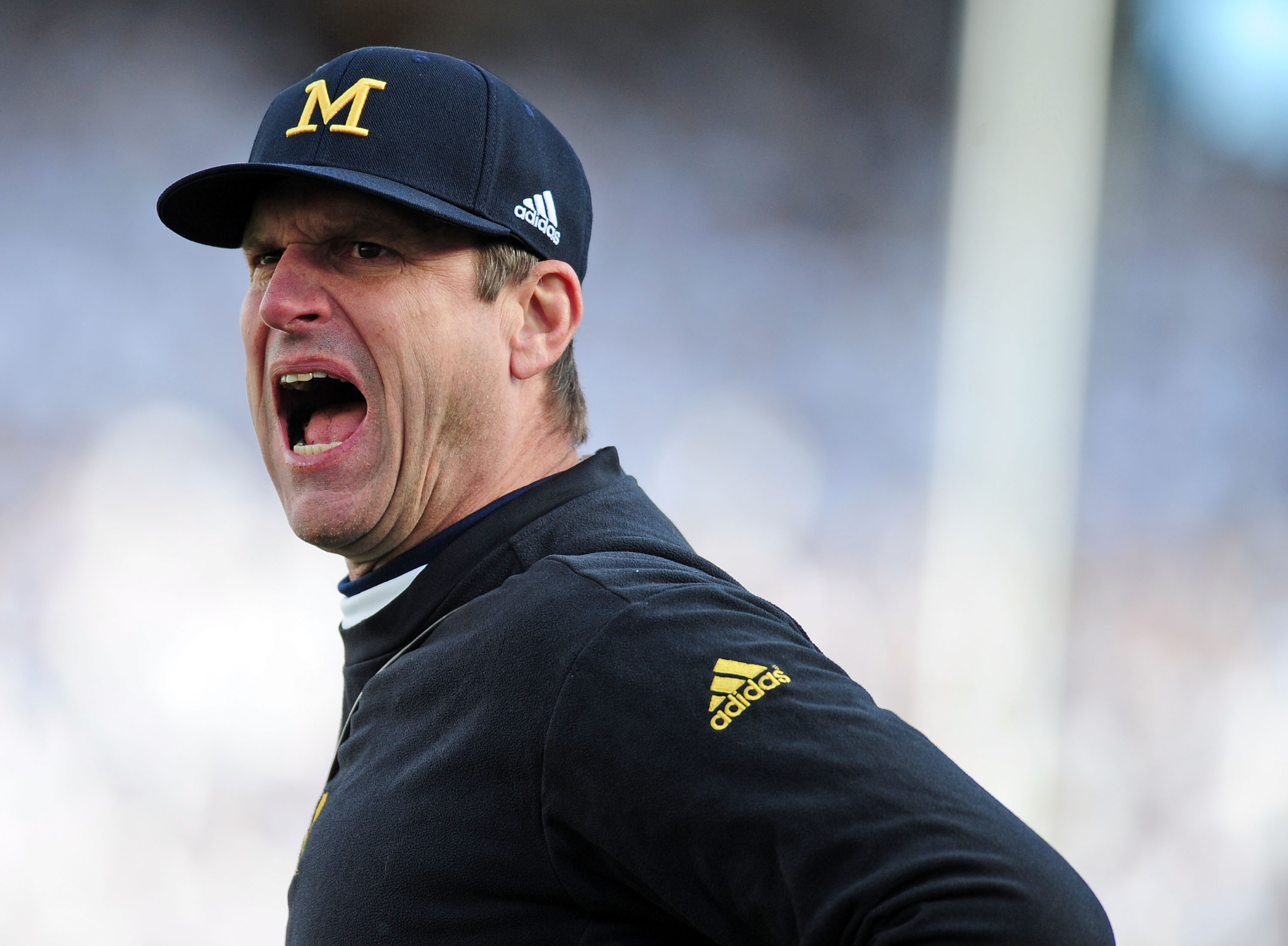 NFL rumors: Michigan head coach Jim Harbaugh not going anywhere, based on  Wolverines' latest move 