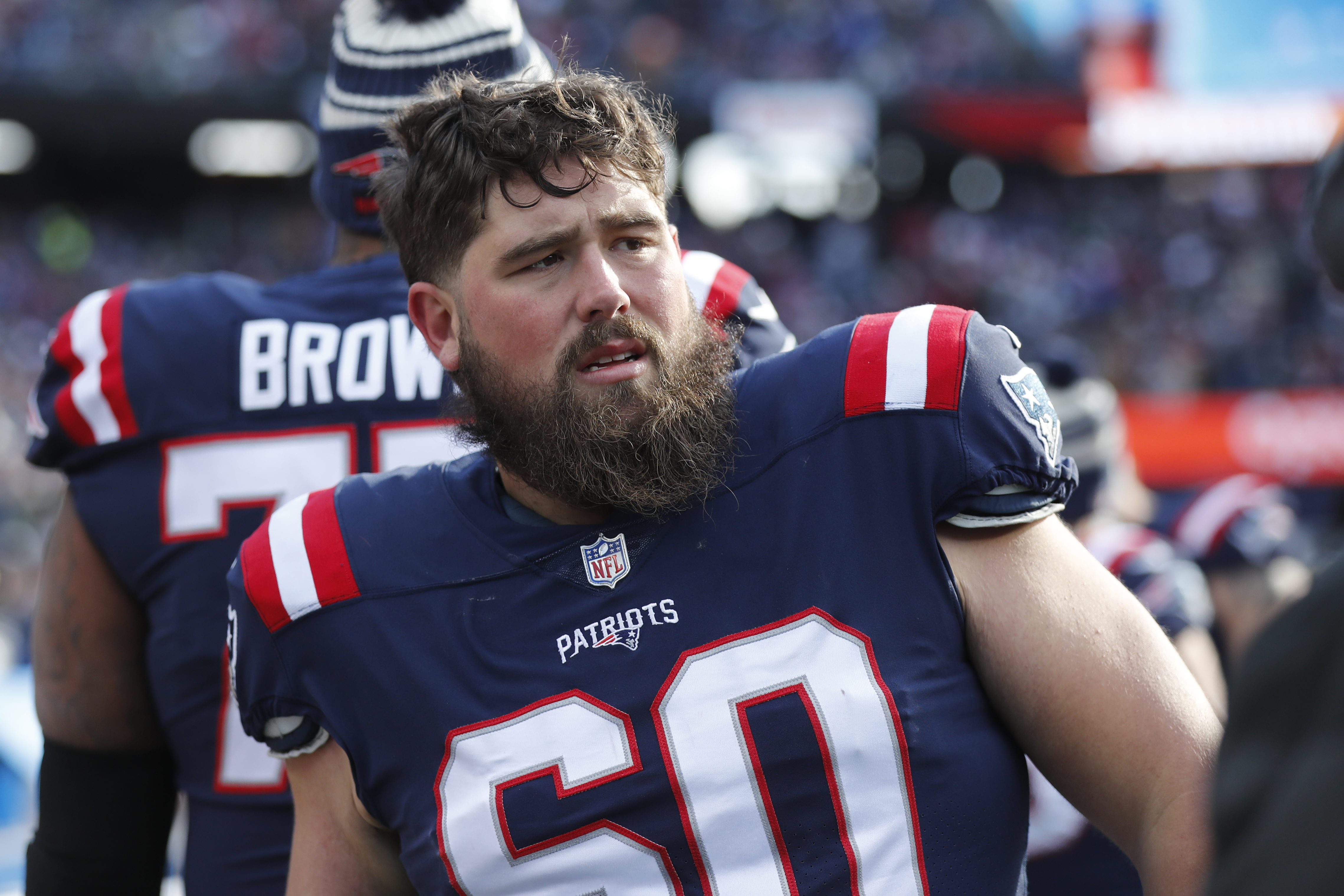 New England Patriots center David Andrews (60) walks off the field