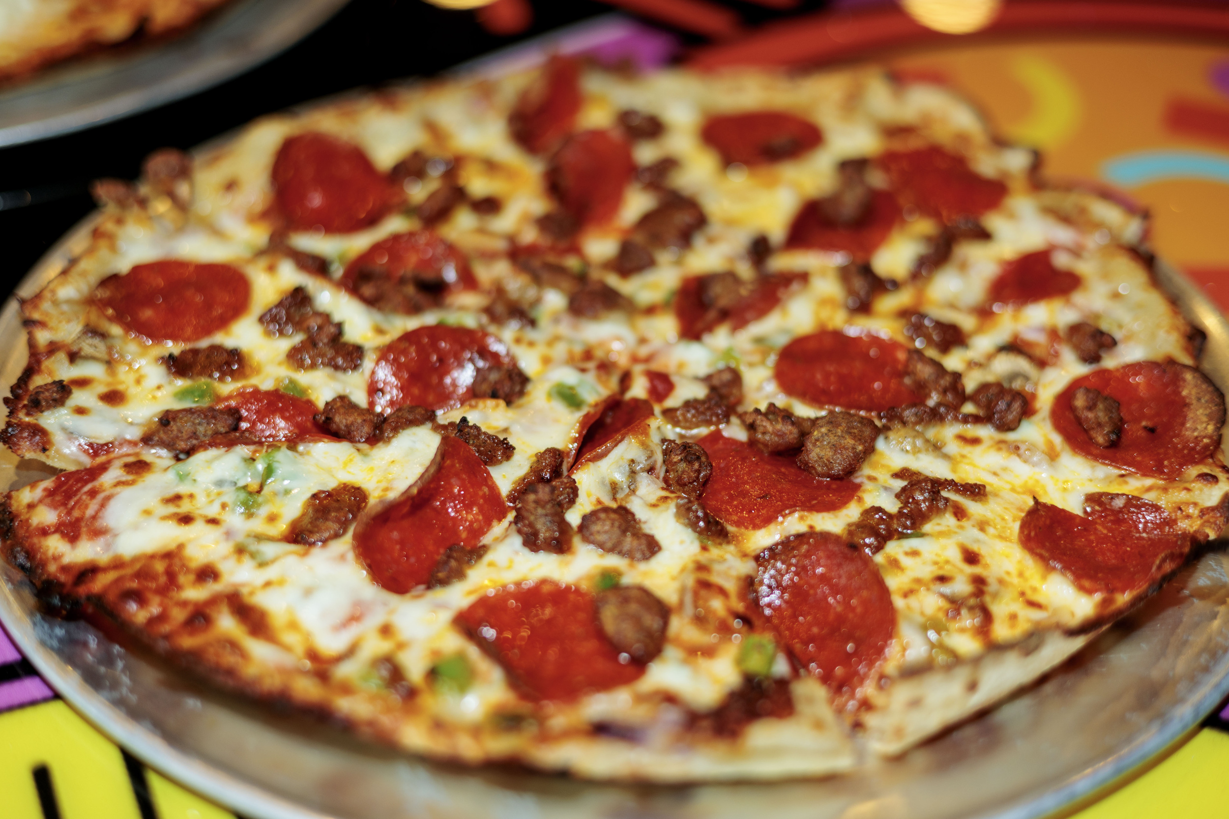 New restaurant brings '80s vibe and 'weird' pizza to Ann Arbor