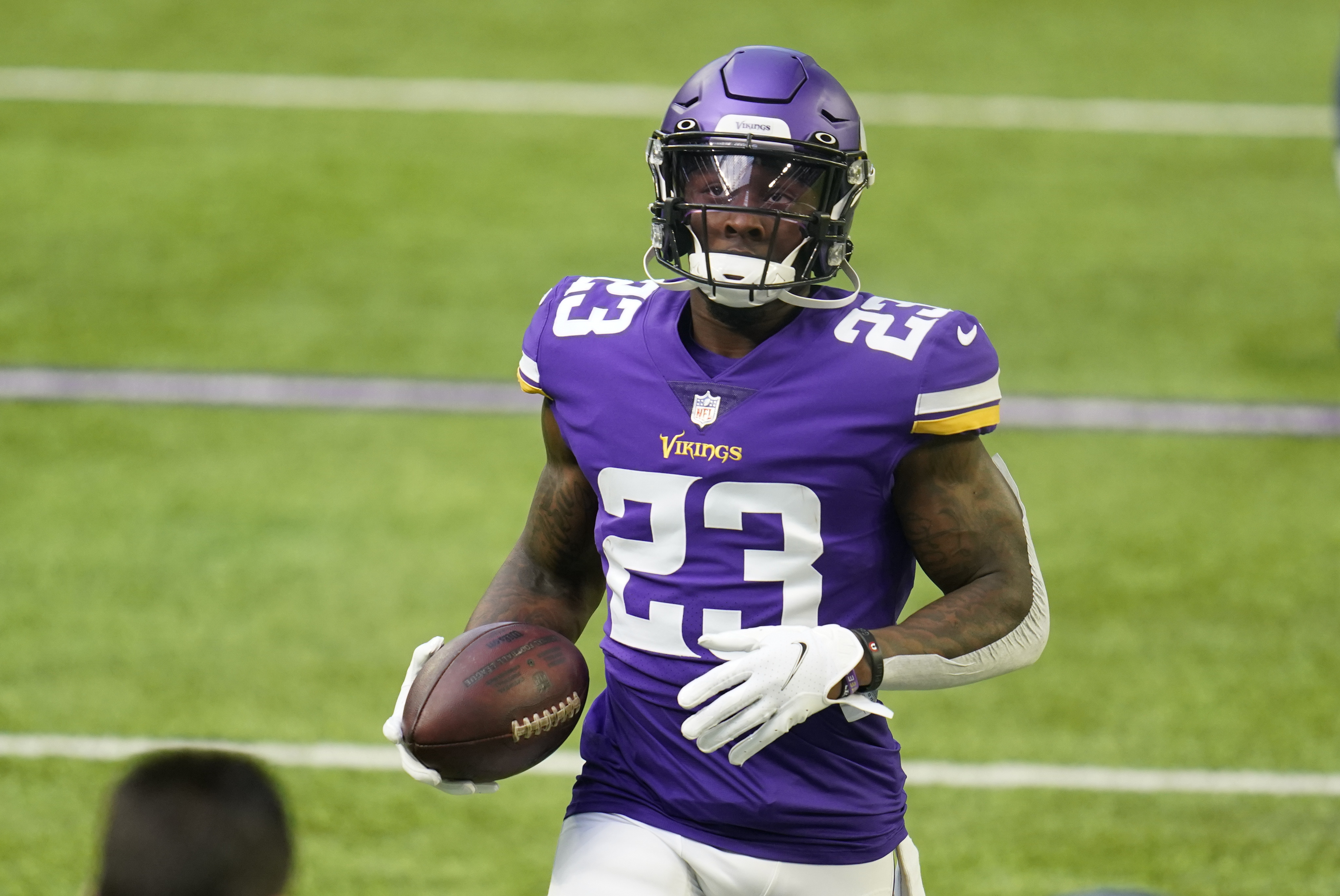 Minnesota Vikings cornerback Harrison Hand (20) warms up before an