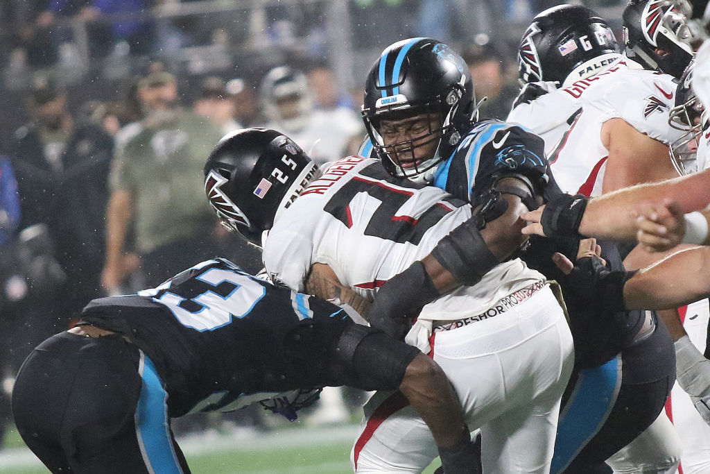 Carolina Panthers defensive tackle Derrick Brown (95) encourages the crowd  to get loud during an NFL football game against the Atlanta Falcons,  Thursday, Nov. 10 2022, in Charlotte, N.C. (AP Photo/Brian Westerholt