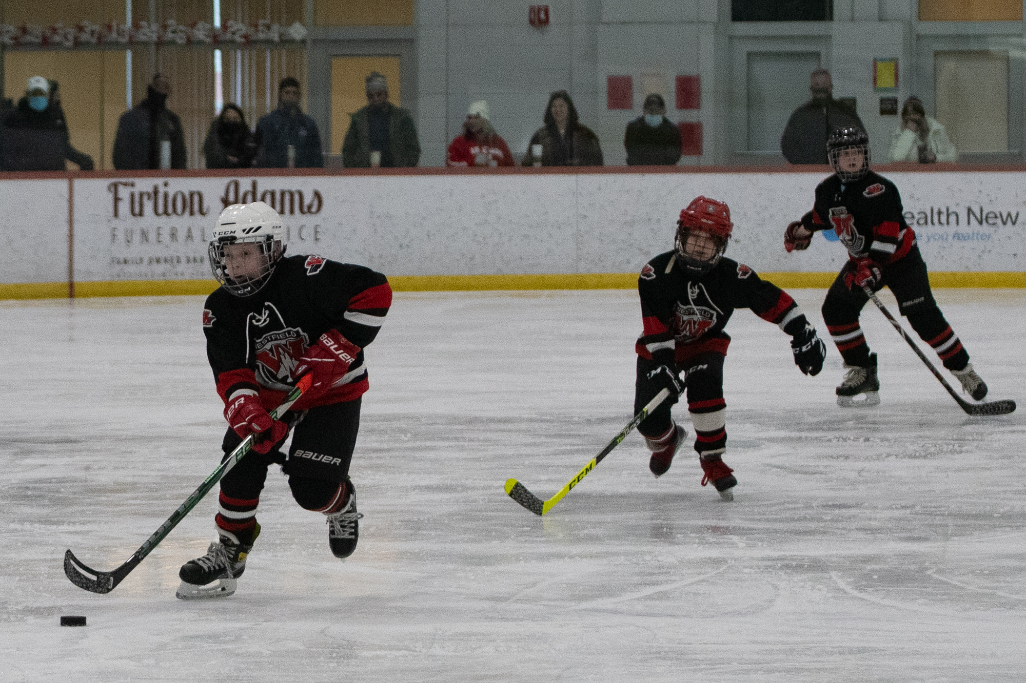 The Westfield Junior Bombers Red take battle the Northern Rhode Island Vikings in a Westfield Youth Hockey Fire & Ice Tournament game Sunday at Amelia Park Arena. The game ended in a 2-2 tie. (Bill Deren / The Westfield News)