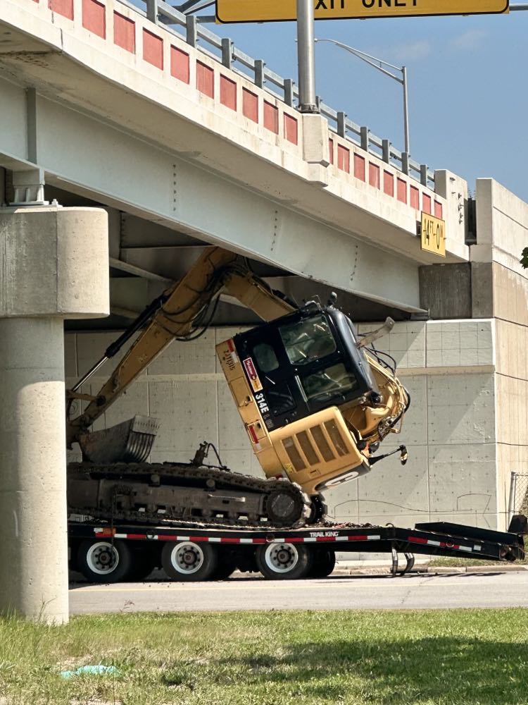 Saginaw firefighters respond after excavator hits I675 overpass
