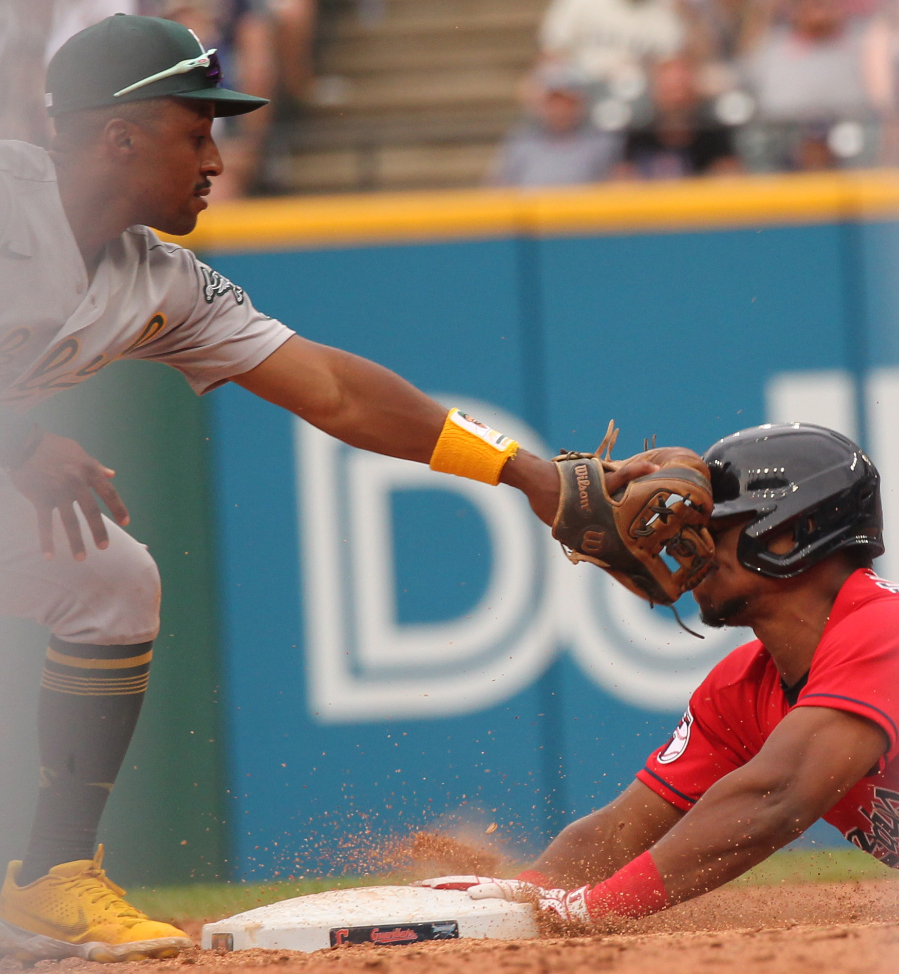 Cleveland Guardians' Oscar Gonzalez hits a double during the sixth