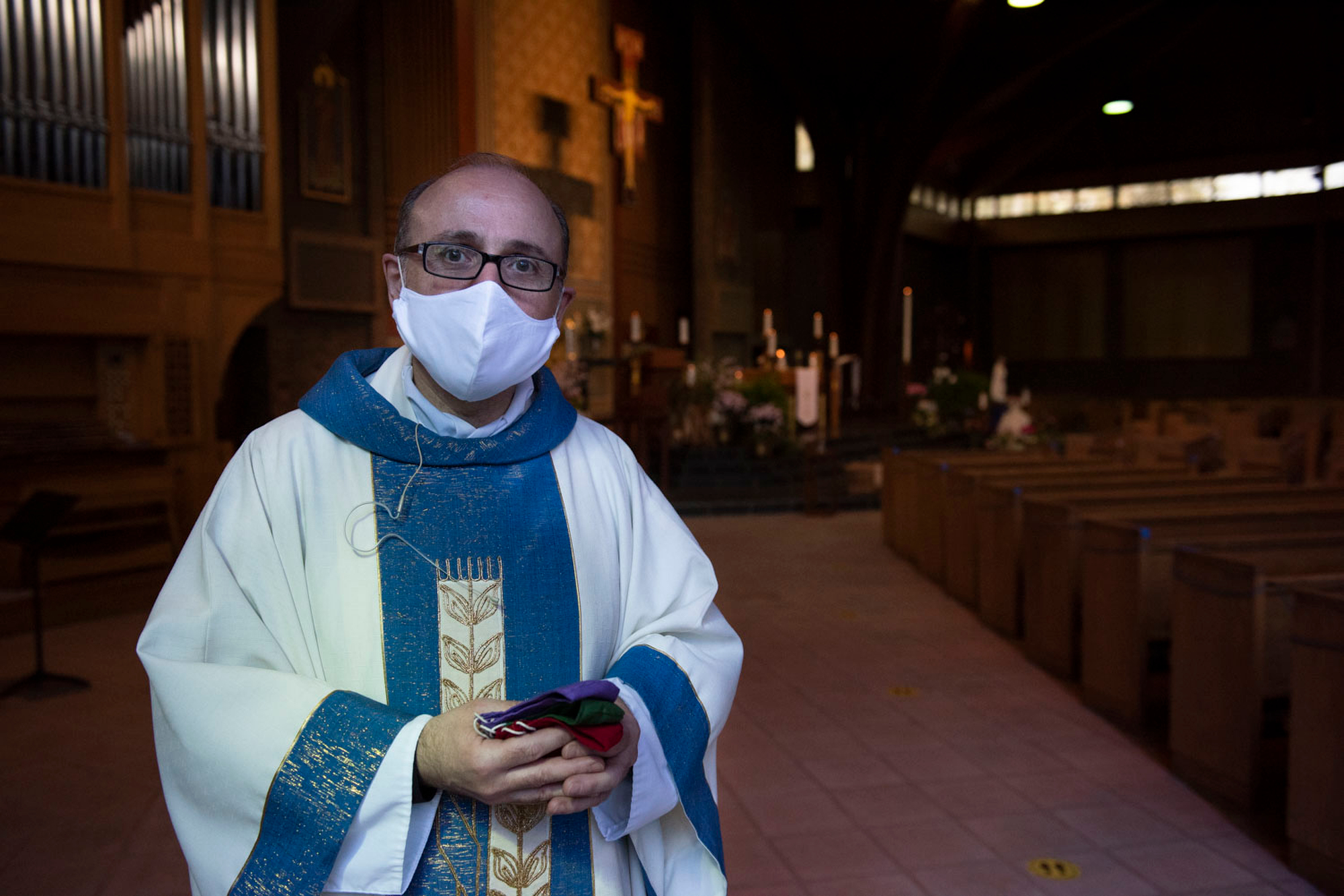 Ann Arbor priest wears a masks sewn by a parishioner to match his ...