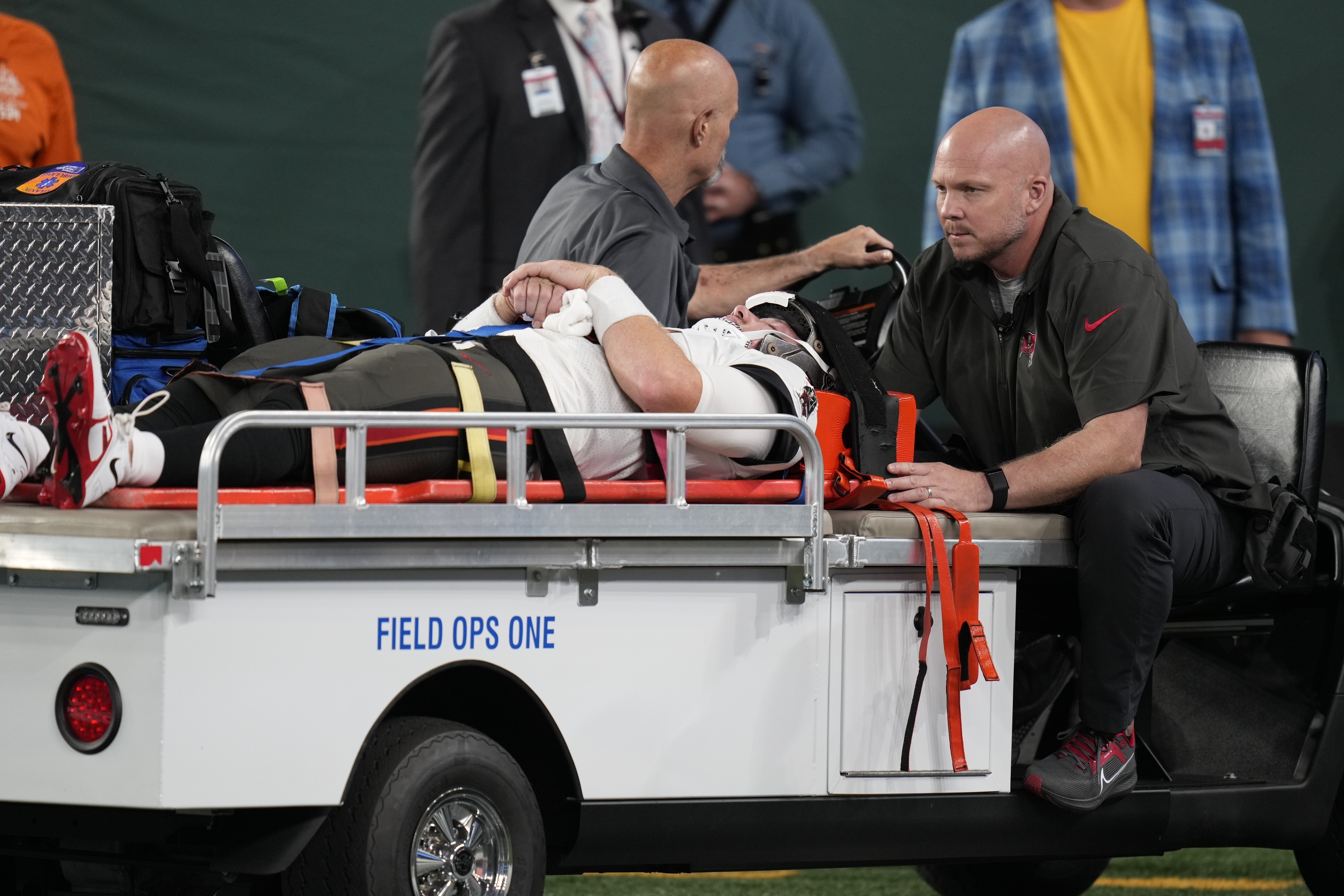 Lions player placed on backboard, taken off field in ambulance