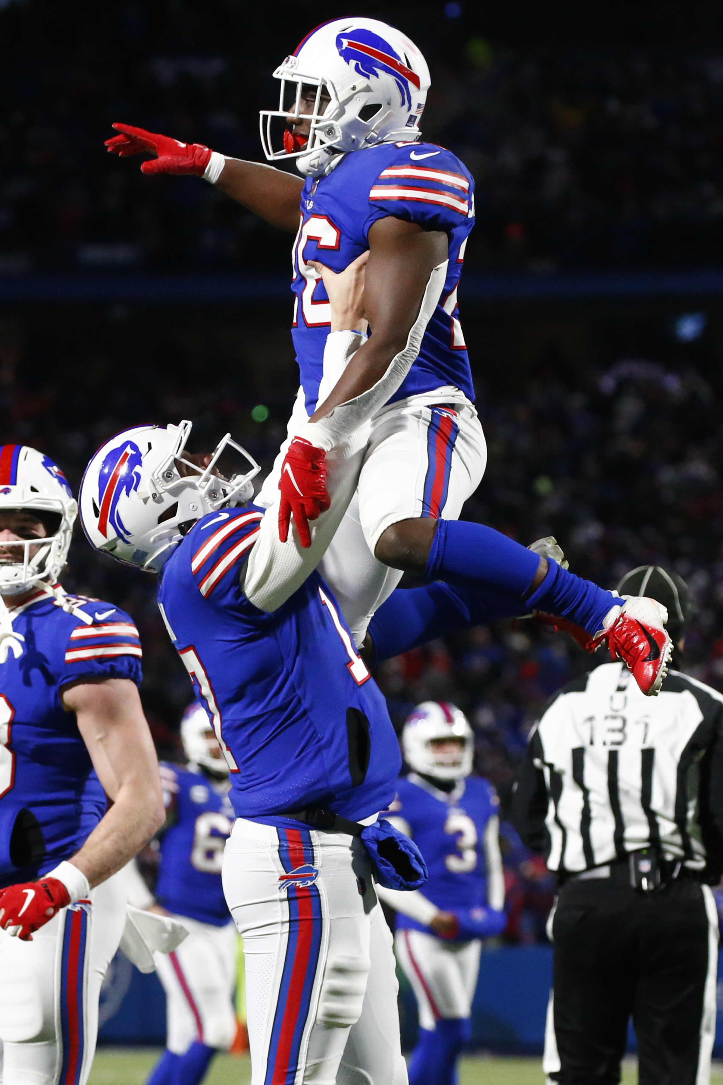 Buffalo Bills offensive tackle Tommy Doyle (72) reacts after