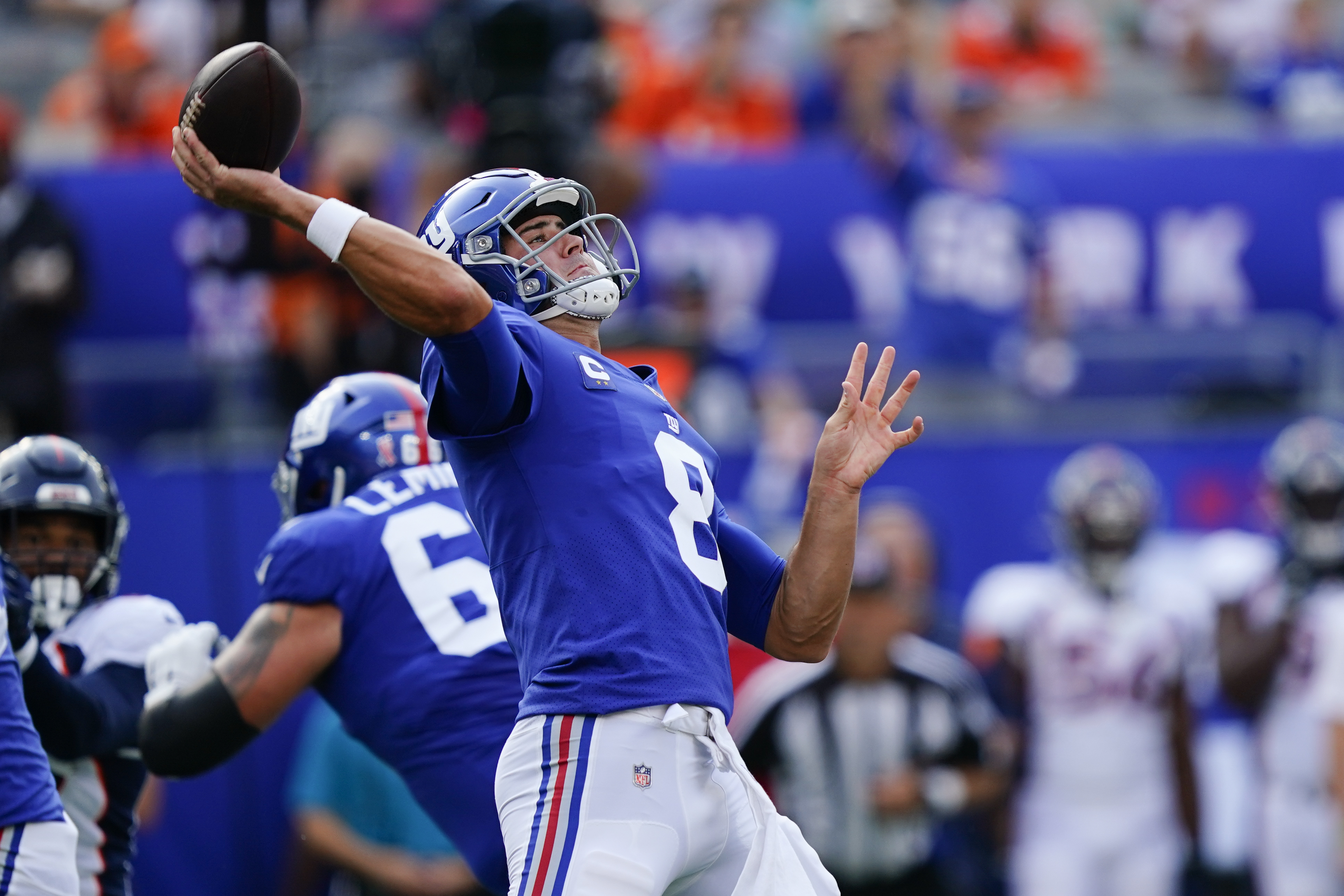 New York Giants quarterback Daniel Jones (8) looks to make a pass during an  NFL football game against the Denver Broncos, Sunday, Sept. 12, 2021, in  East Rutherford, N.J. The Denver Broncos