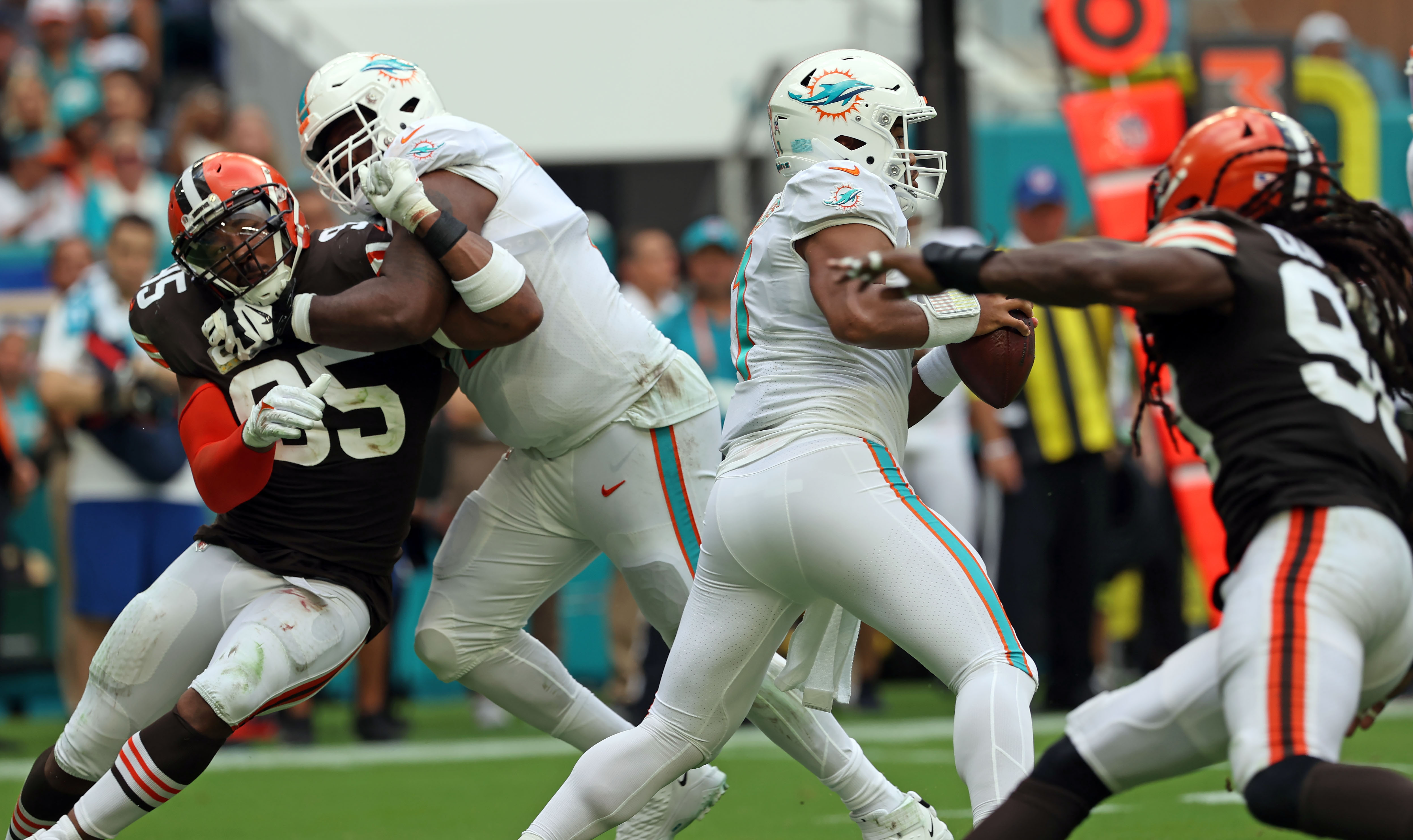 FILE - New Orleans Saints tight end Juwan Johnson (83) attempts to block  Cleveland Browns defensive end Myles Garrett (95) during an NFL football  game, Saturday, Dec. 24, 2022, in Cleveland. As