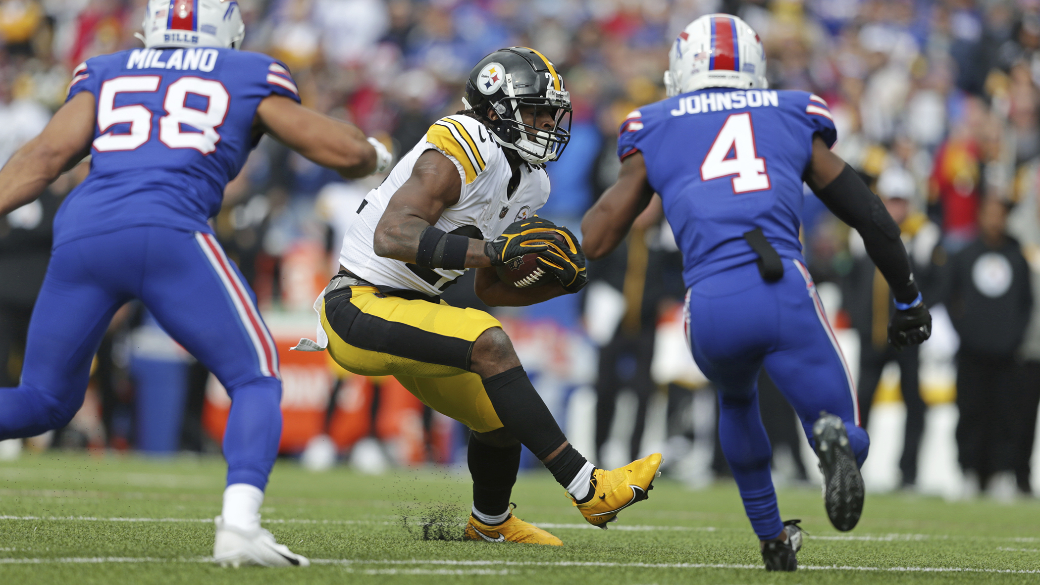 Buffalo Bills running back Devin Singletary (26) runs with the ball during  the first half of an NFL football game against the Pittsburgh Steelers in  Orchard Park, N.Y., Sunday, Oct. 9, 2022. (