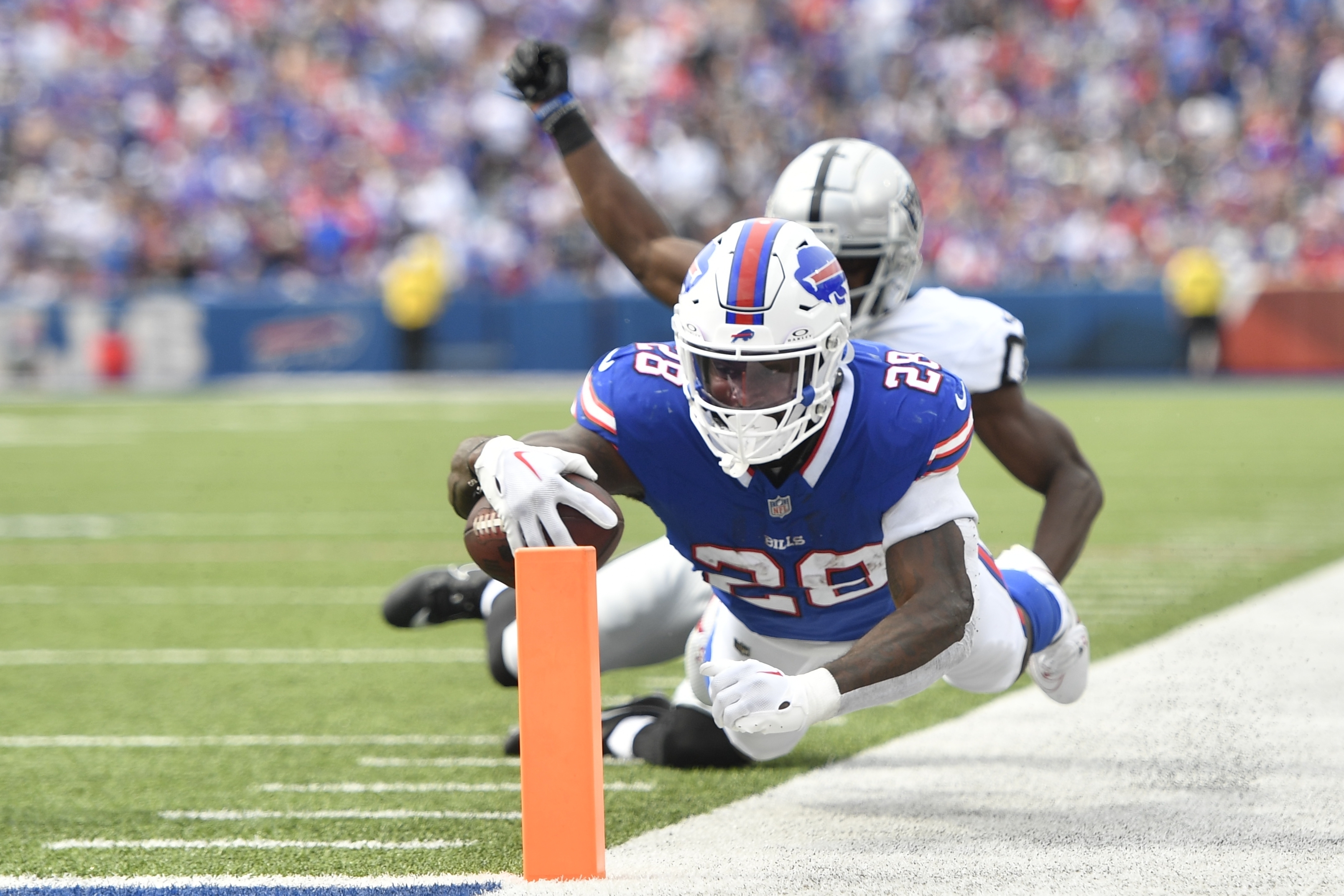 Las Vegas Raiders' Davante Adams (17) celebrates after scoring a touchdown  during the first half of an NFL football game against the Buffalo Bills,  Sunday, Sept. 17, 2023, in Orchard Park, N.Y. (