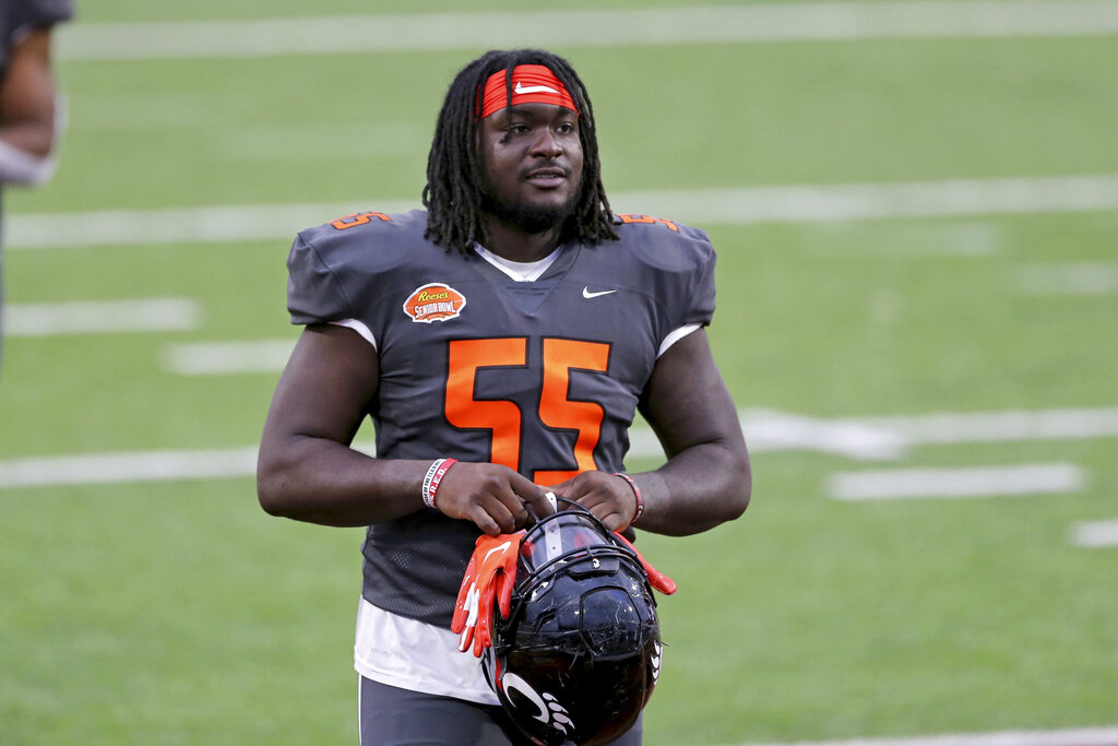 Cleveland Browns offensive tackle James Hudson III (66) walks back to the  line of scrimmage during