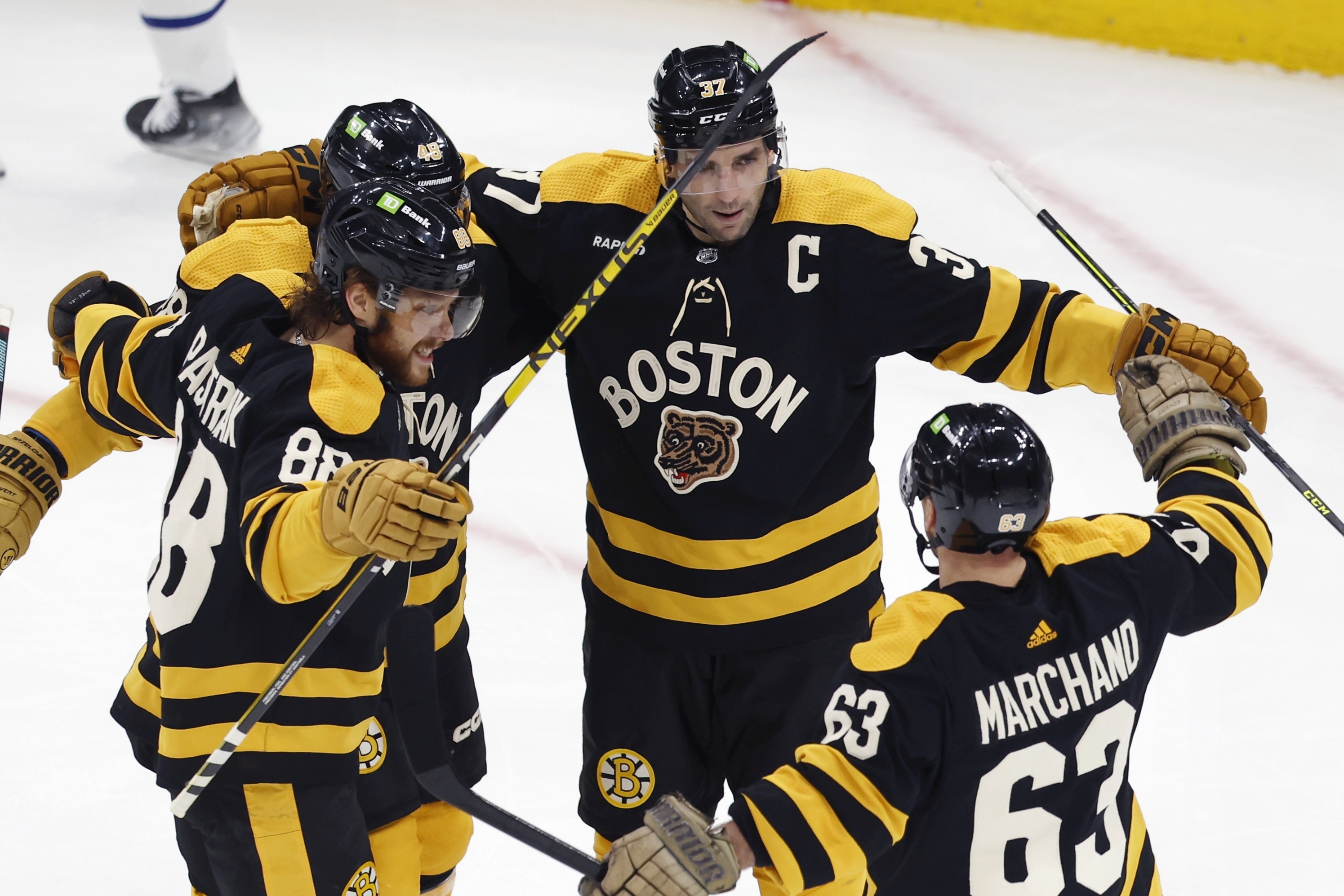 Grzelcyk scores late as Bruins beat Maple Leafs 4-3