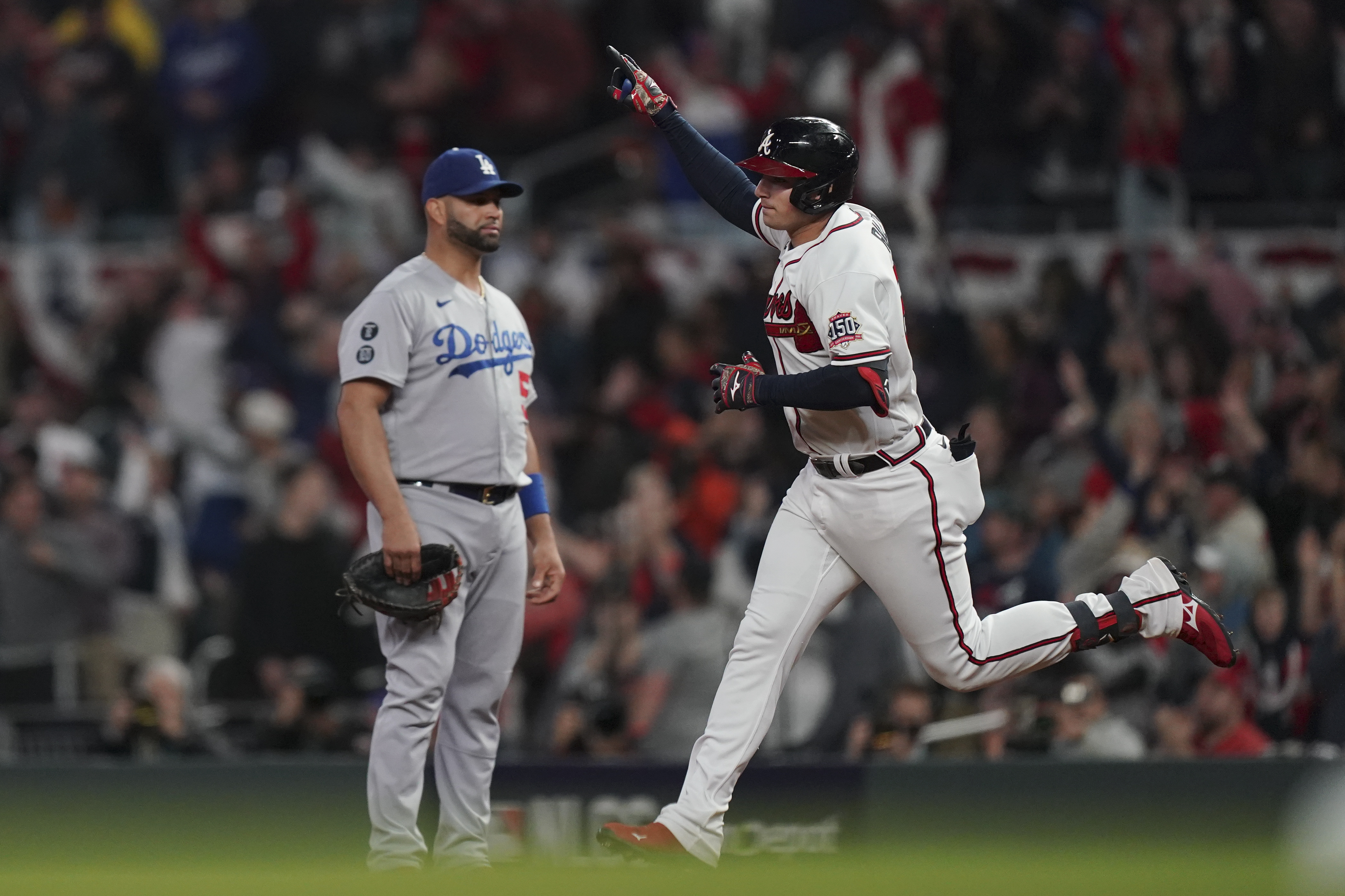 Atlanta Braves' Guillermo Heredia runs to first base after a hit in the  third inning of a baseball game against the Los Angeles Dodgers, Saturday,  June 5, 2021, in Atlanta. (AP Photo/Brynn