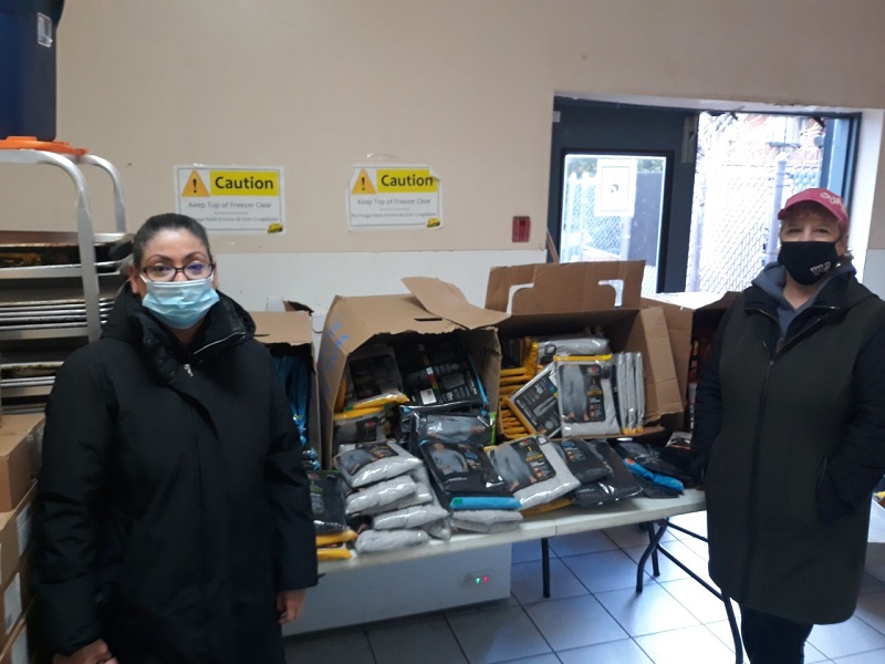 Weehawken Elks Lodge #1456 partnered with Walmart to provide supplies for the Palisade Emergency Relief Corporation. Pictured: Meylin Acosta Administration Assistant, PERC; Lorraine Wuillamey, ER.