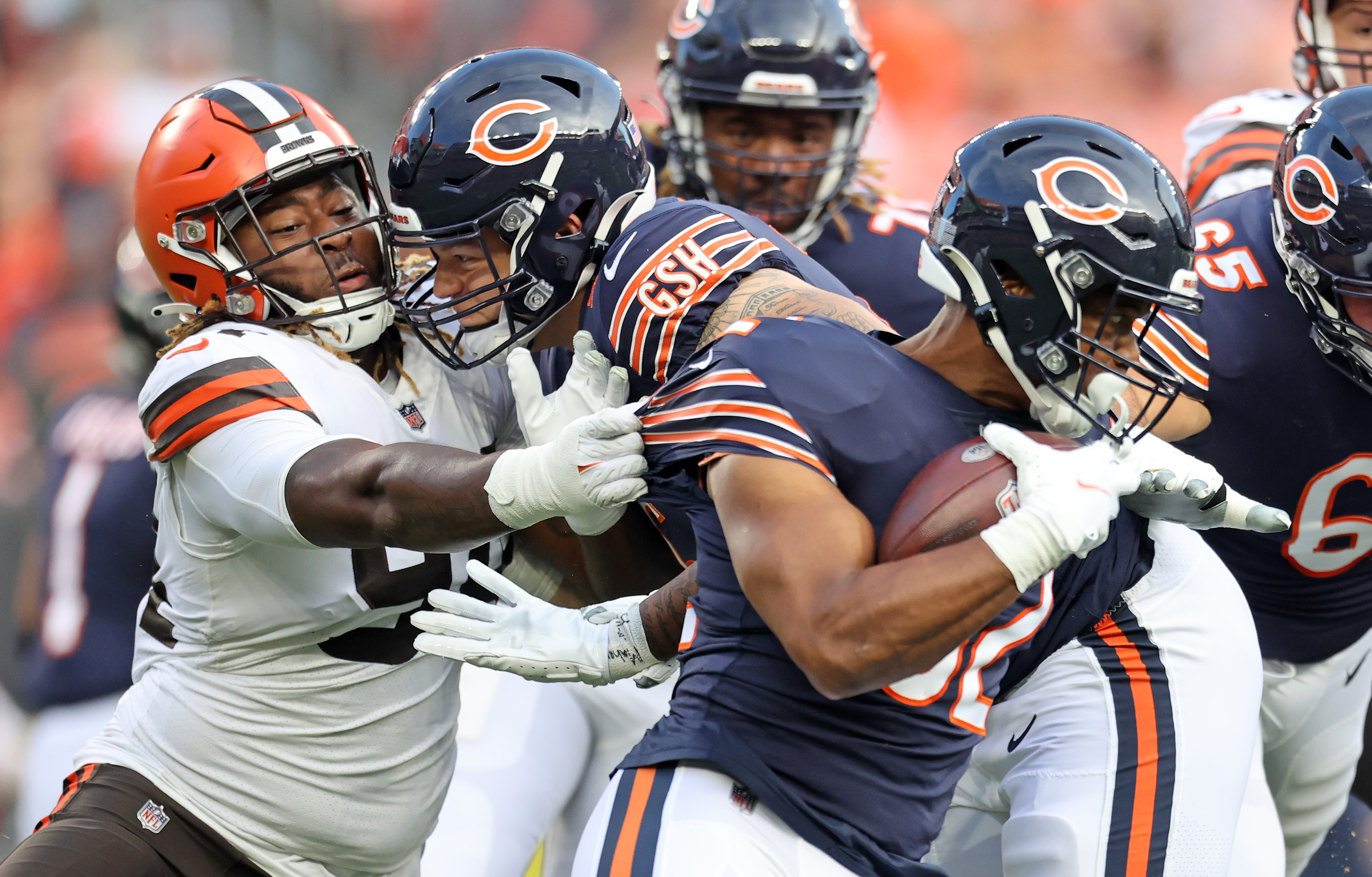 Cleveland Browns D'Ernest Johnson runs behind a block from Justin