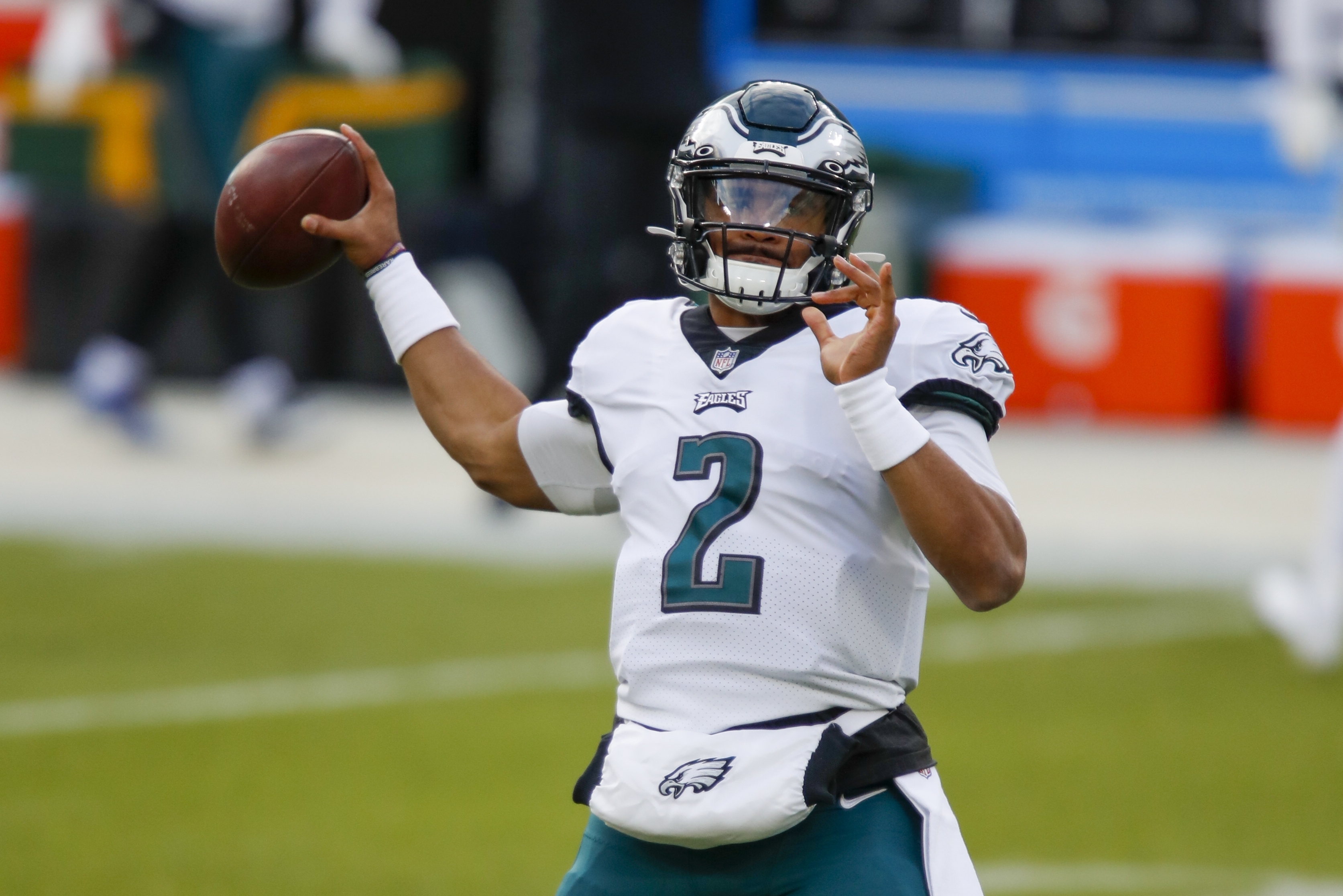 Philadelphia Eagles' Jalen Hurts warms up before an NFL football