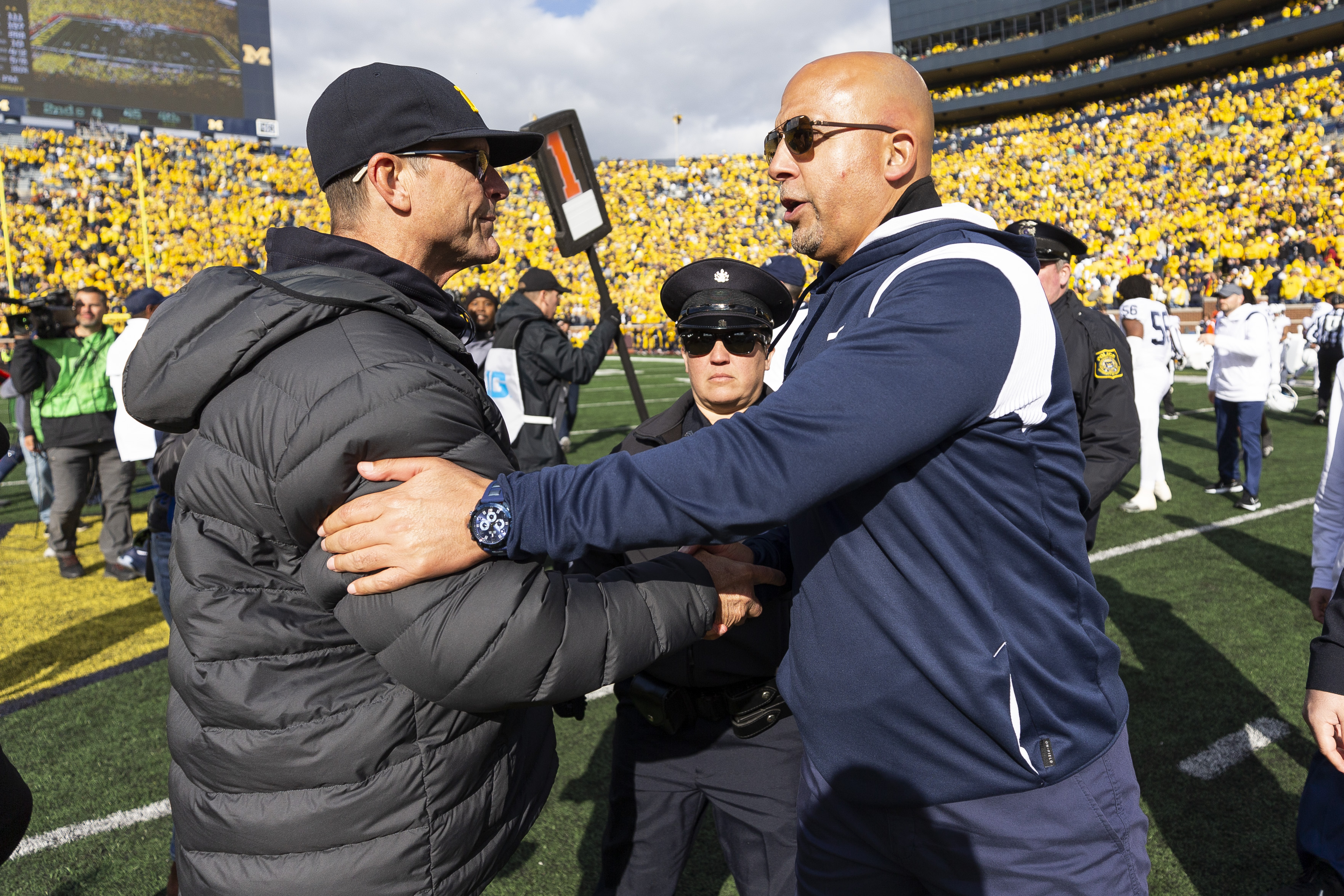 John Harbaugh gets best, barely, of little brother Jim