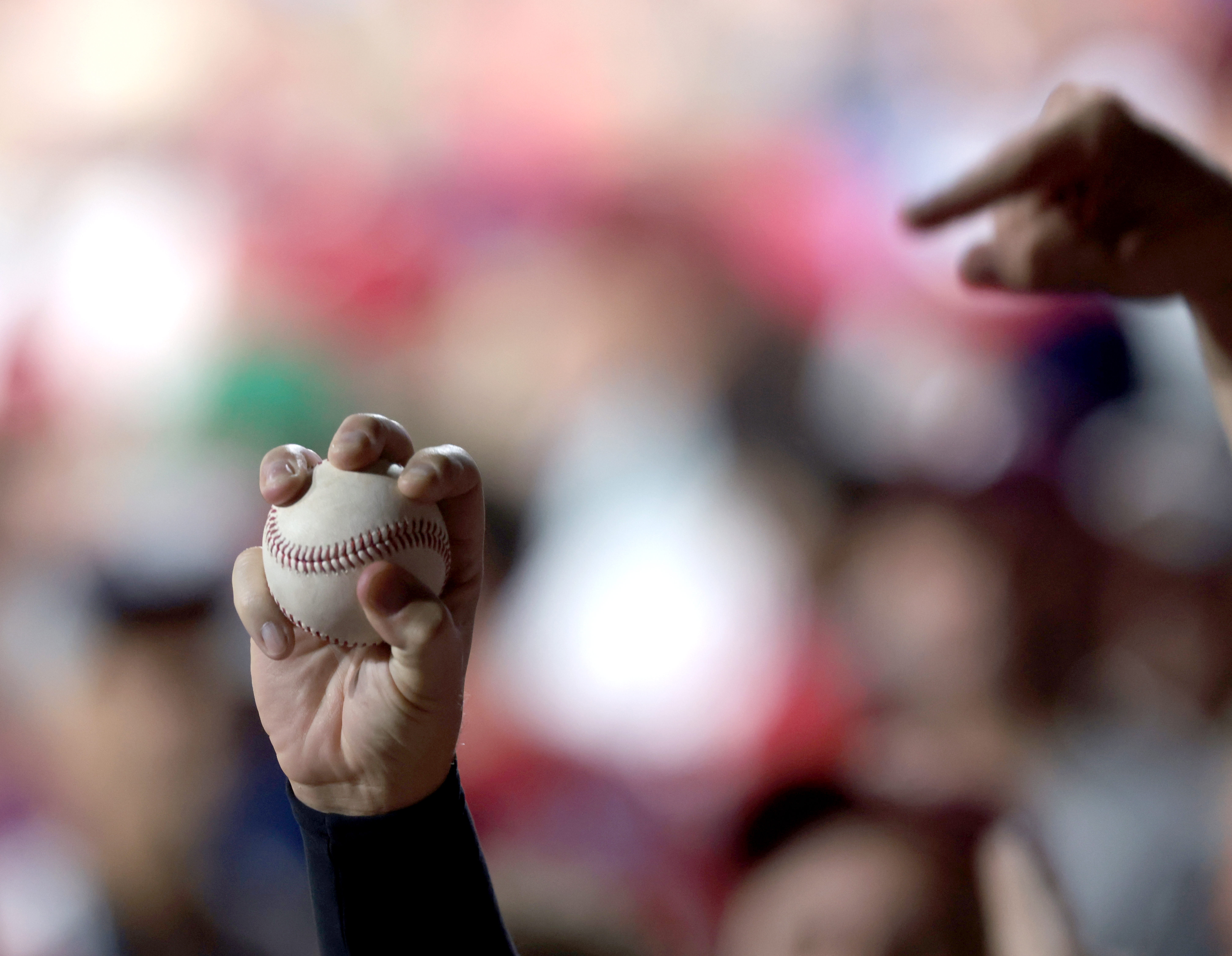 A fan watched a foul ball in the thirds inning  vs. the Houston Astros during Game 3 of the World Series at Citizens Bank Park, Tuesday, Nov. 1 2022.