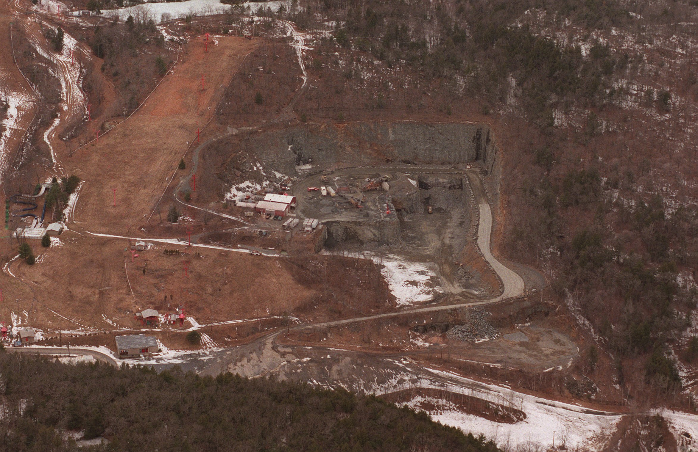 A photo from 1999 showing work underway at the quarry site on Mt. Tom.  The quarry has been inactive since 2012, and the crater is much larger than shown here.
