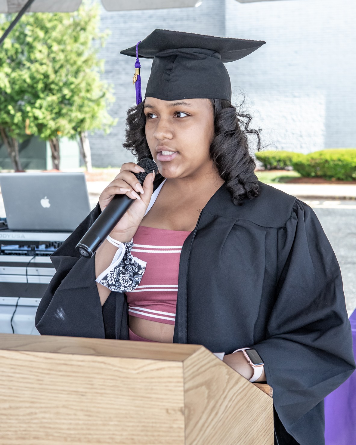 Student speaker Jayla Fisher at the Veritas Prep Charter School 8th grade 2020 DRIVE-In Graduation held in the parking lot of the Eastfield Mall. (Danny Nason Photo)